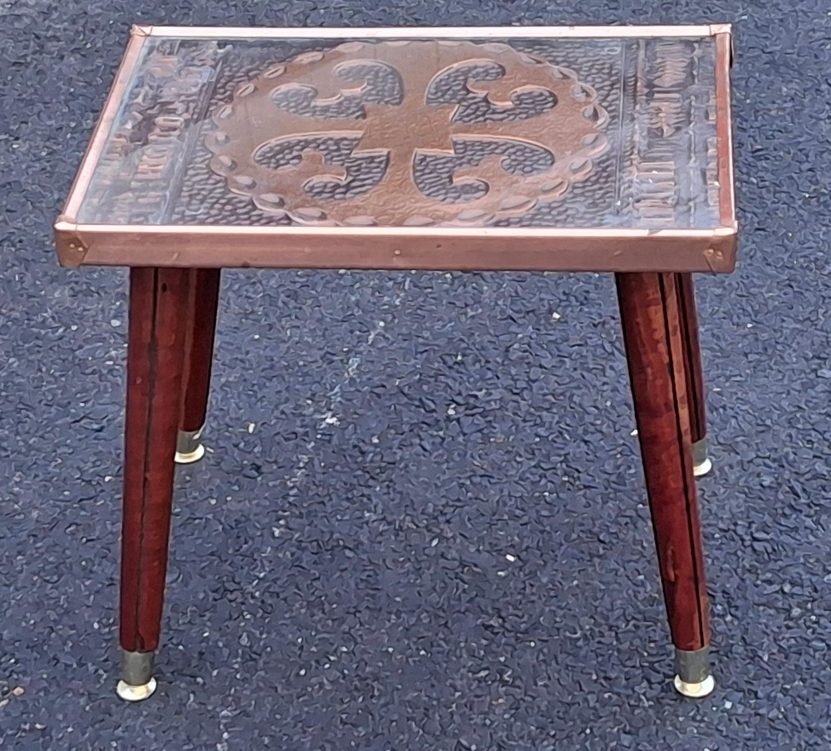 A late 20th Century Gothic Style Copper Clad over Wood and brass capped legs Side Table with glass top insert. Measures 18