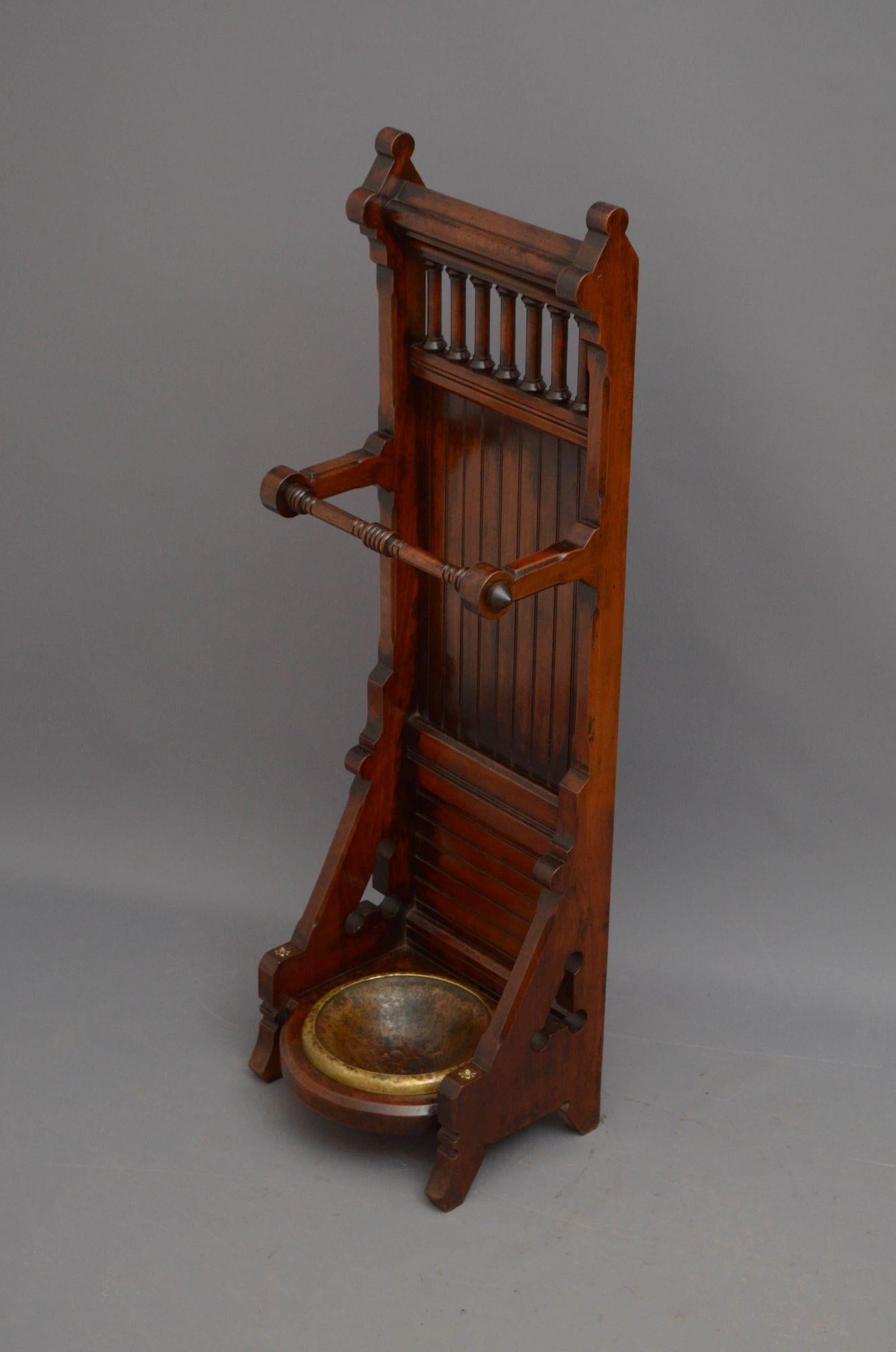 Sn5513 Stylish Victorian umbrella stand in mahogany, having turned and ringed umbrella holder with panelled backing and spindled gallery to the top, the base having Gothic carvings and encloses original drip tray, all in home ready condition.