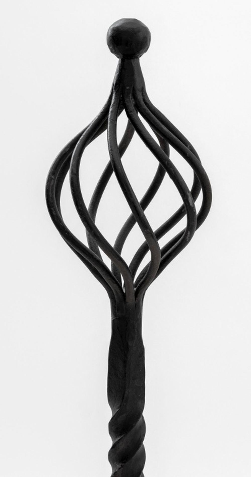 Pair of Gothic Revival Wrought Iron Andirons, with openwork twist finial and twist support on scroll form base. 24.25