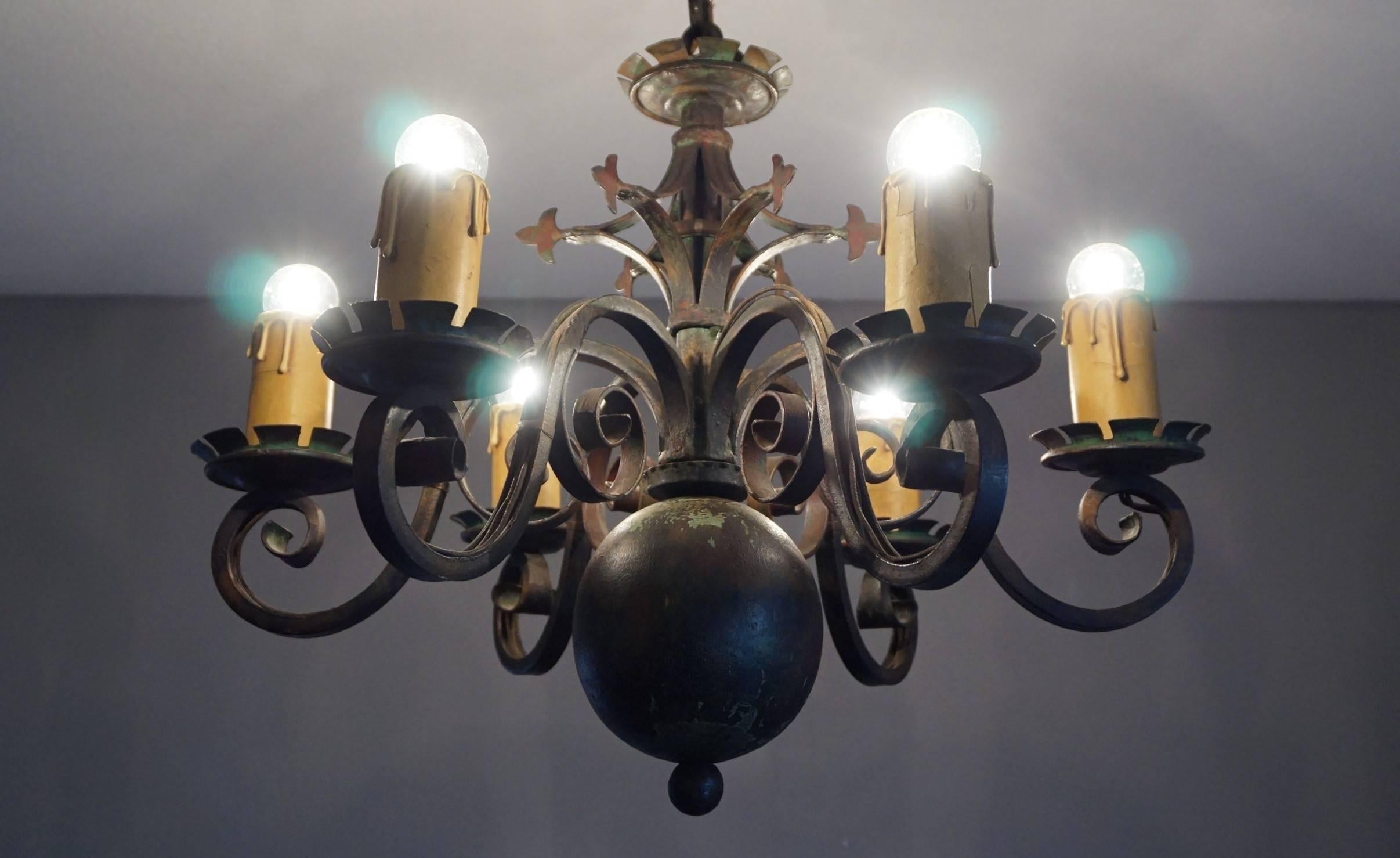 Handcrafted, early 20th century light fixture.

This small and all handcrafted chandelier from the early 1900s could be the ideal lighting solution for a room with a Gothic Revival and/or Mediëval theme. Finding craftsman in this day and age that
