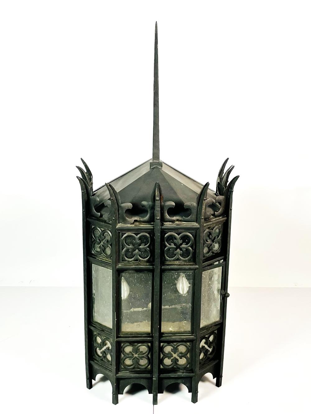 Gothic revival wrought iron and seeded glass wall sconce that came out of the Syklvester Stallone Beverly Park home recently sold to Adele.

The piece was removed fromt he premises on 7/18/2022 as per tag attached to the sconce.

We have a total of