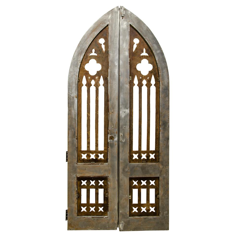 Salvaged from an east coast church, these late 19th century metal doors are statement makers. The solid bronze inner panels offset the steel framing to create a beautiful sense of contrast.