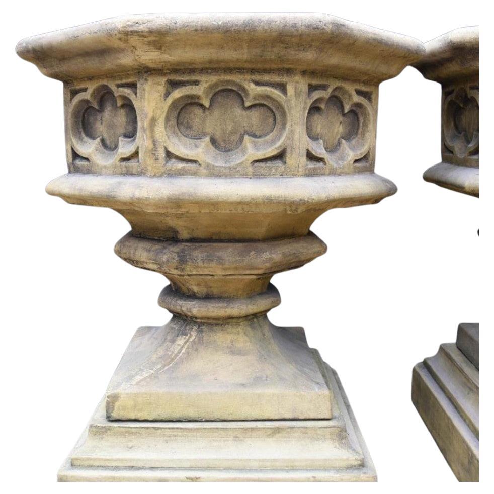 Gorgeous pair of English stone garden urns of octagonal form
Great for the garden, can you imagine how these would look with flowers overflowing?
Stand on the square pedestal bases for classical look
Great architectural pair
Offered in great