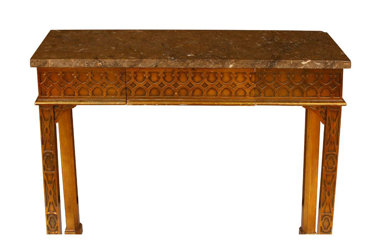 Gothic style console with stone top and drawer makes for a beautiful and useful piece in a number of rooms. Carved details on straight legs and apron with gold painted accents.