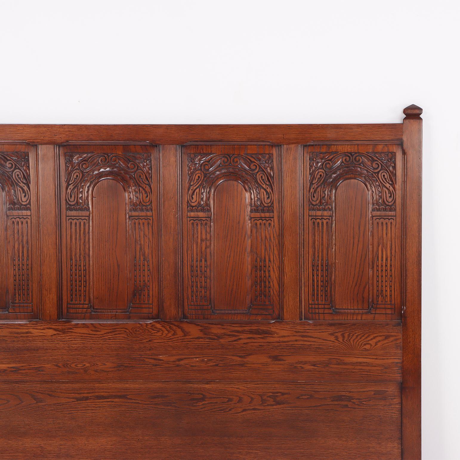 Carved Gothic style carved oak, king size bed, C. 1980. For Sale
