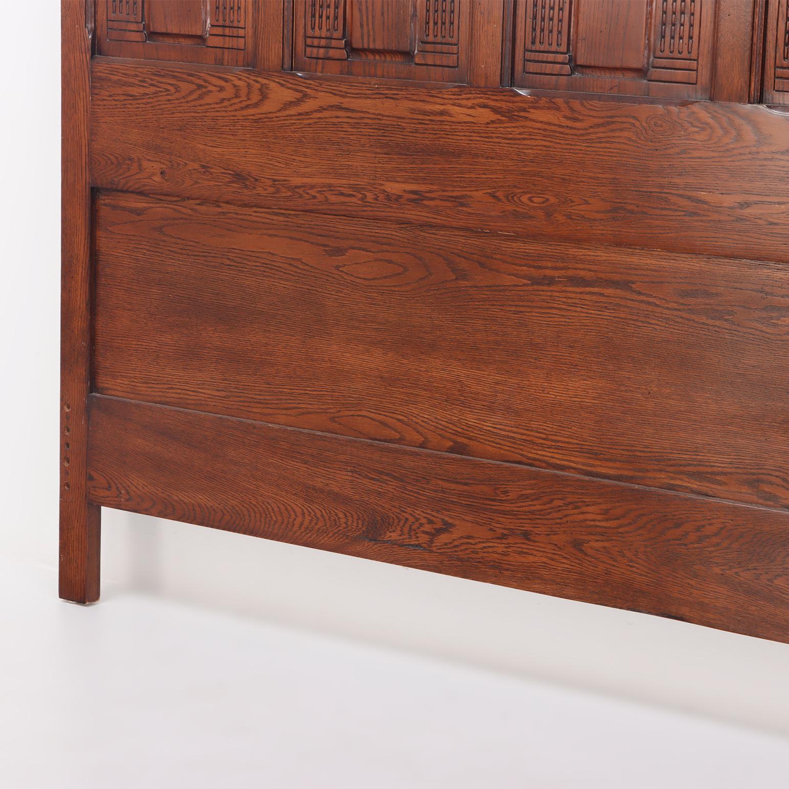 20th Century Gothic style carved oak, king size bed, C. 1980. For Sale