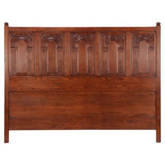 Gothic style carved oak, king size bed, C. 1980.