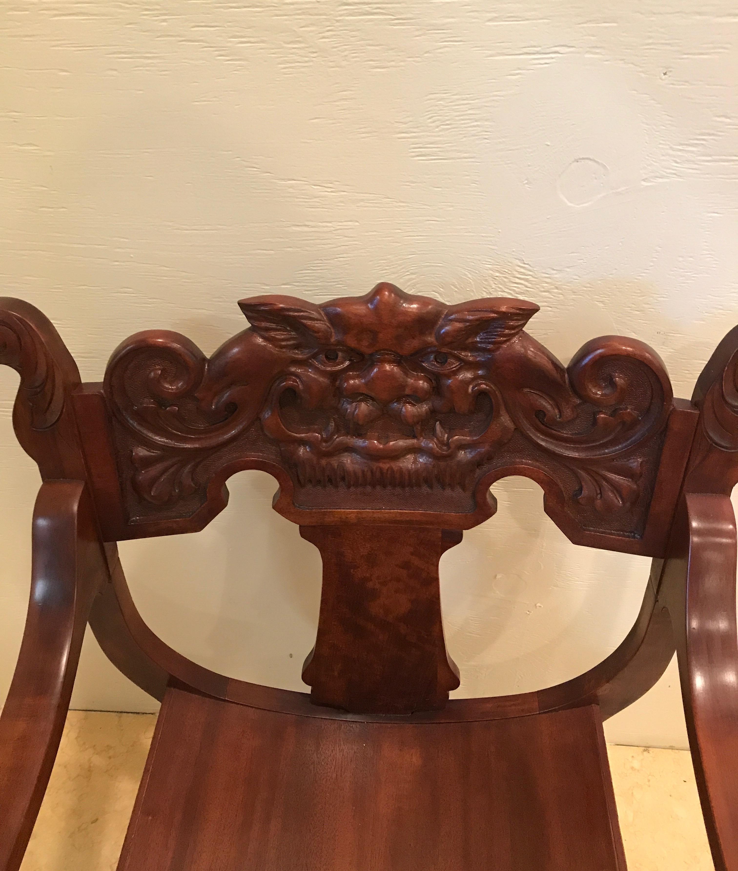 antique chair with carved face