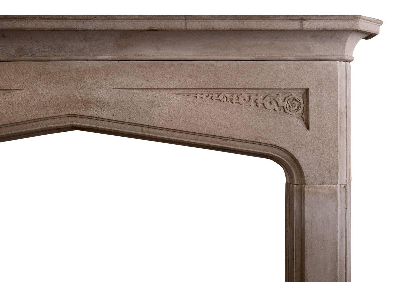 An English stone fireplace in the Gothic manner. The moulded legs surmounted by arched frieze with carved spandrels. Moulded shelf above, English, circa 1900.


Shelf Width:	1680 mm      	66 1/8 in
Overall Height:	1310 mm      	51 5/8 in
Opening