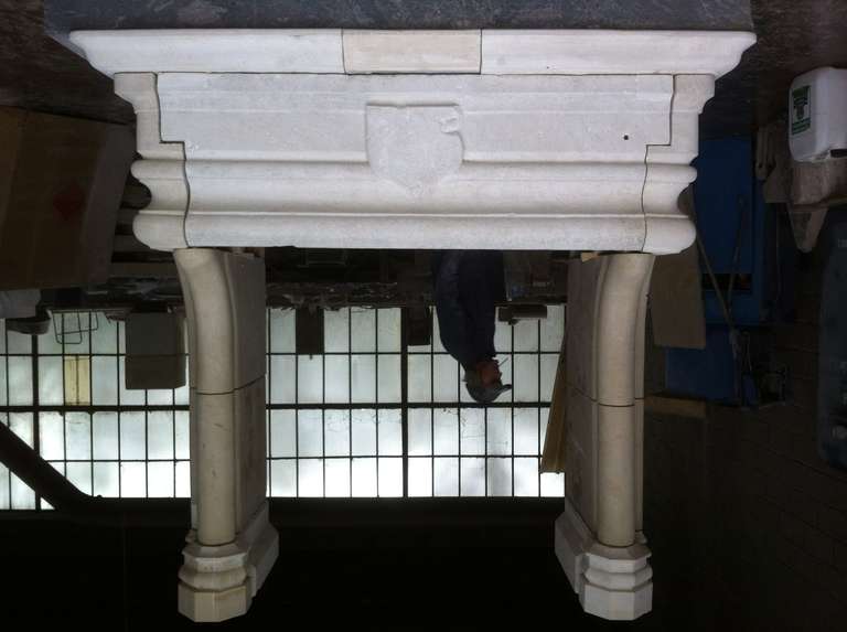 Rare mantel Gothic period late 15th century. The mantel part is original. This fireplace has been restored around the mantel middle part.
Pure french limestone from 20th century for the Restoration done.
Legs handcrafted in double columns (photos
