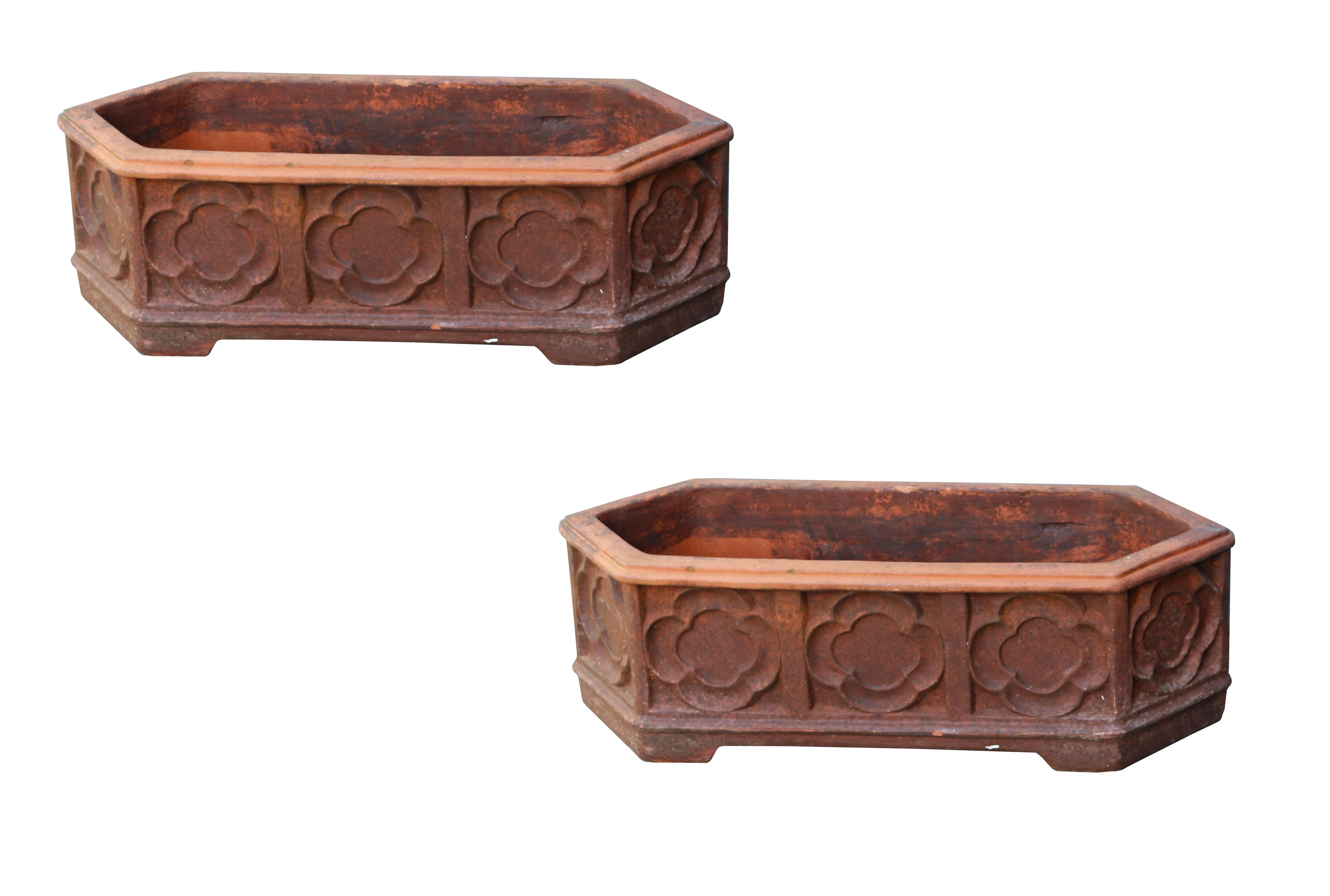 Terracotta Gothic style garden planters. Circa 1950, these reclaimed handcrafted terracotta planters are statement pieces. Both their size and appearance allude to certain Gothic styles and would contrast brilliantly with a vibrant plant to