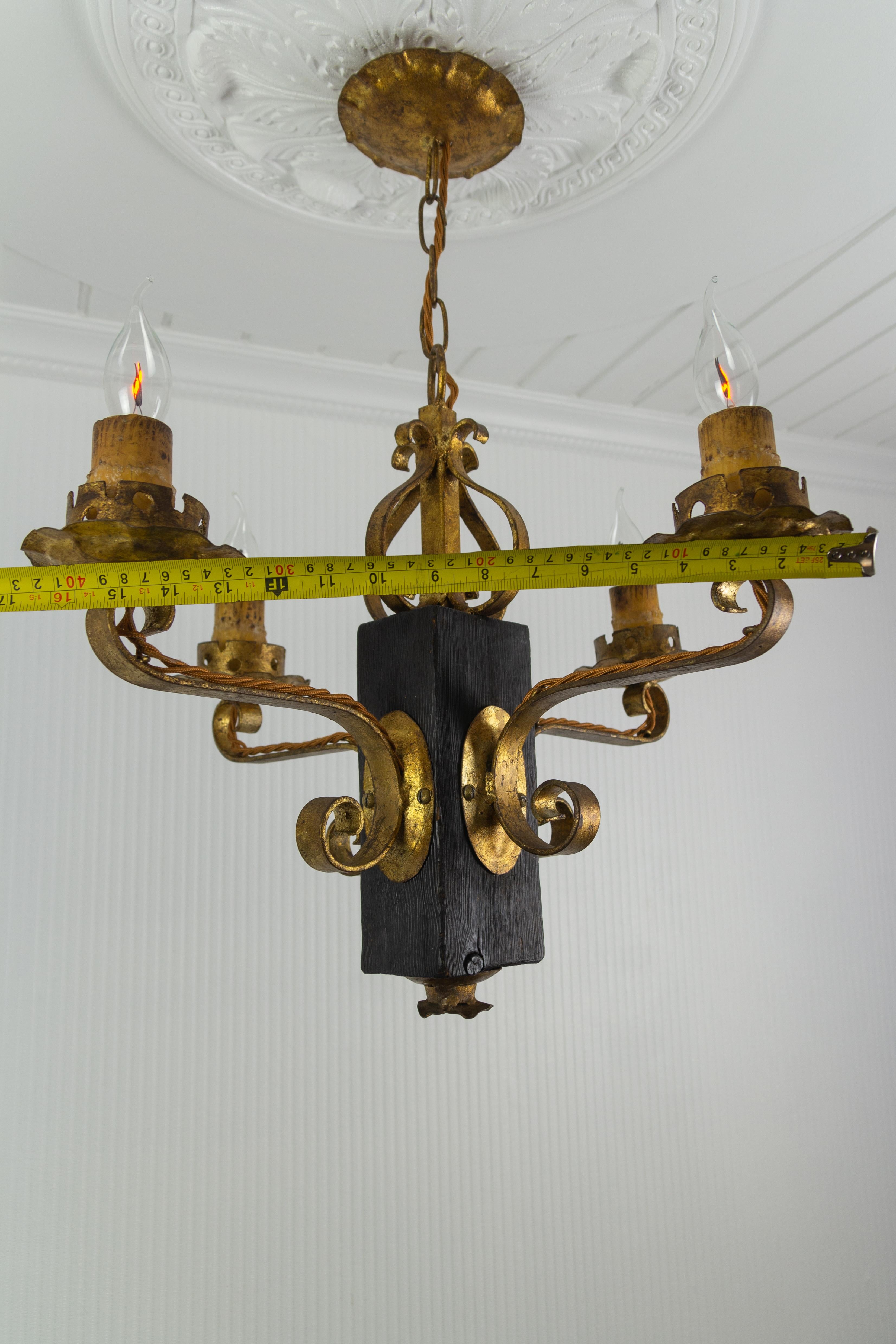 Gothic Style Gilt Wrought Iron and Black Wood Four-Light Chandelier For Sale 6