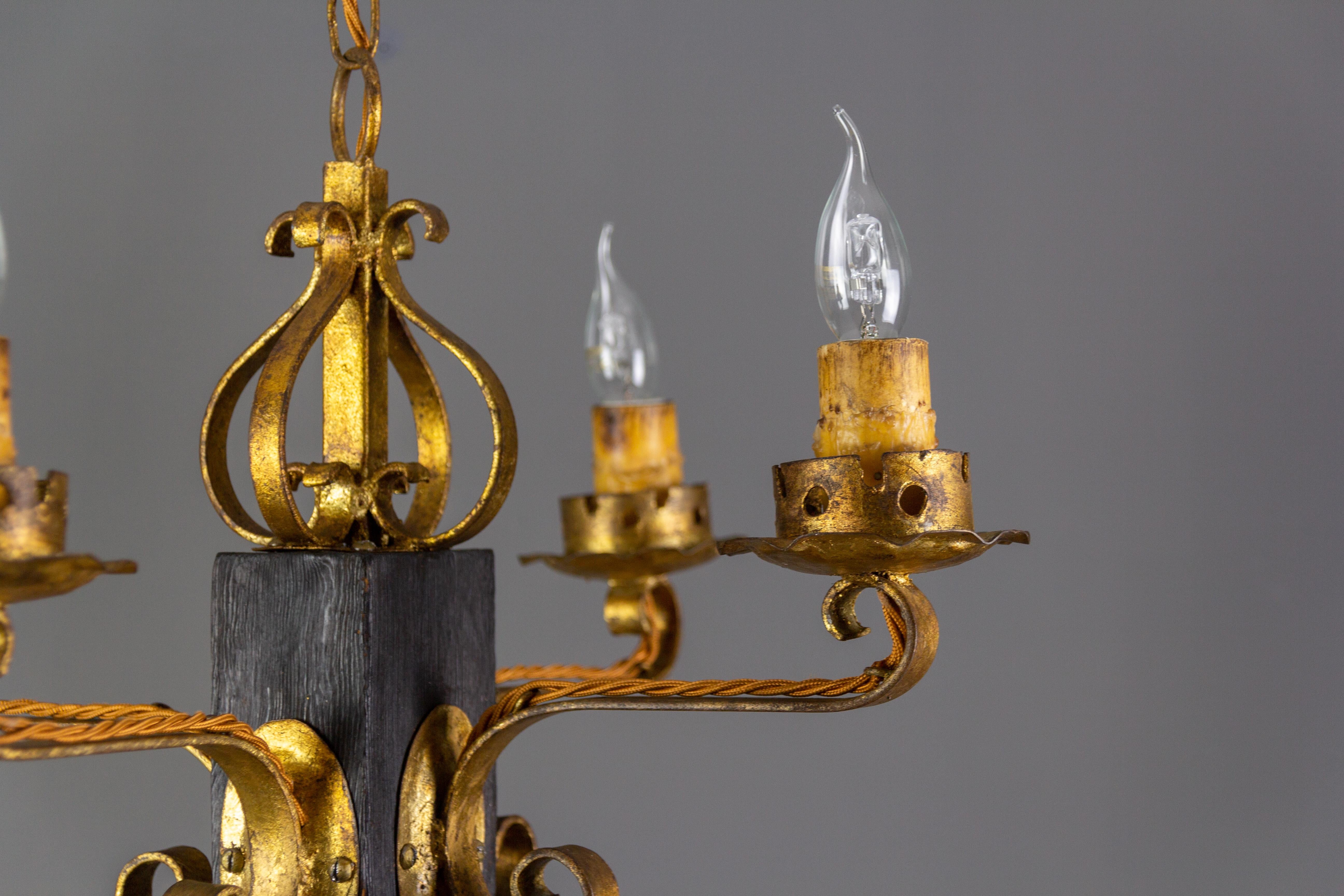 lampadari in ferro battuto e legno