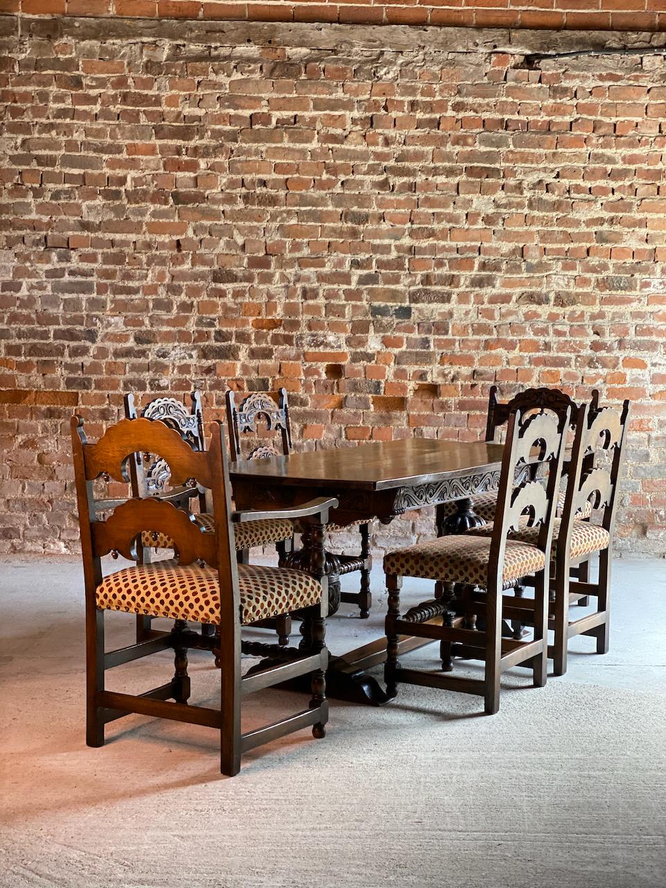 Gothic style oak refectory table and six chairs set of 1

Fabulous Gothic style English oak refectory table and six matching chairs, the thick and heavy four plank top, raised on fluted cup and cover baluster columns supports with block feet