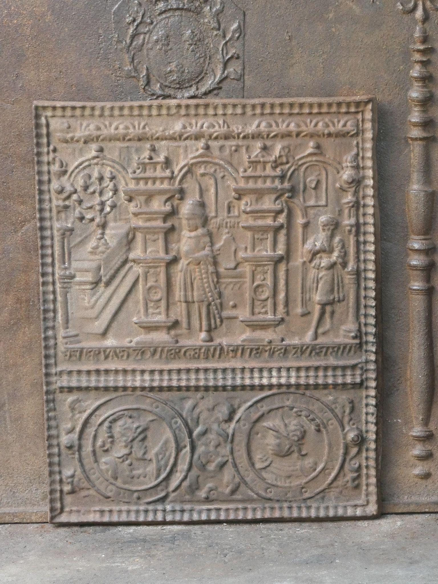 20th century Gothic Style German fireback with a religious theme. 

The fireback has a natural brown patina. Upon request it can be made black / pewter color with stove polish at no extra cost. The condition of the fireback is good and it is fit for