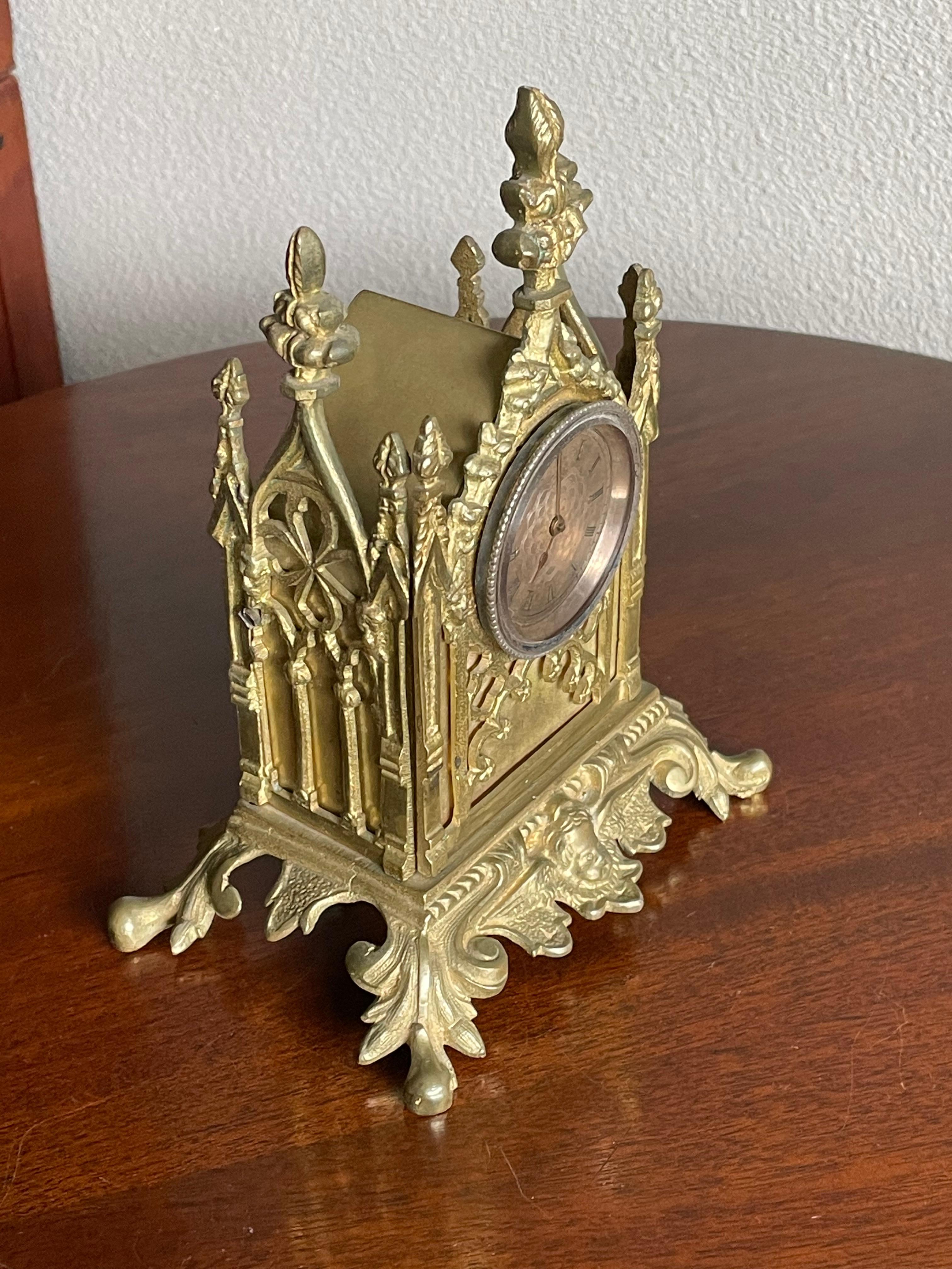 Small Gothic table clock with gilt bronze (or possibly golden) pocket watch by John Worboys of London, 1780-1810.

We know too little about antique pocket watches to be able to tell you if the pocket watch inside this unique bronze table clock is