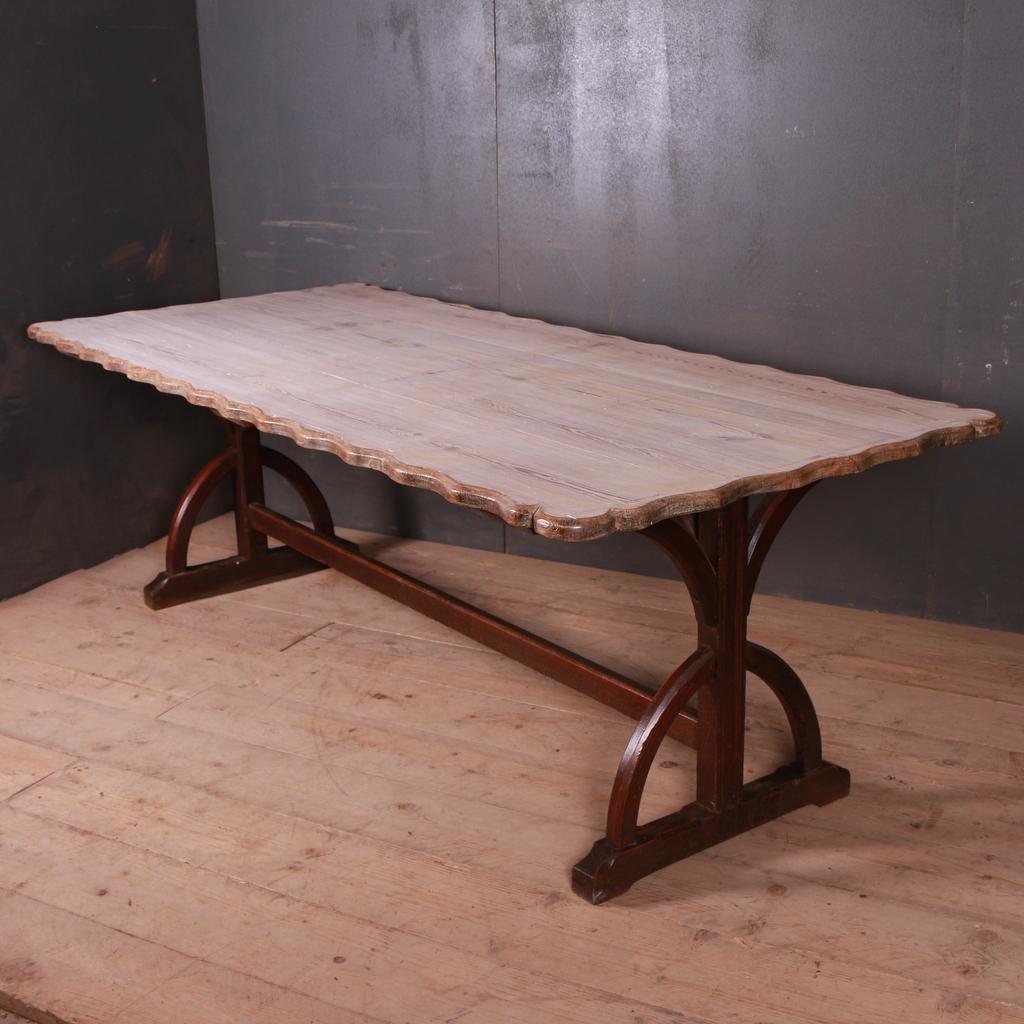 Wonderful Gothic pine trestle table/ library table. Unusual shaped molding to the top, 1840.

Dimensions
89 inches (226 cms) wide
39 inches (99 cms) deep
29.5 inches (75 cms) high.