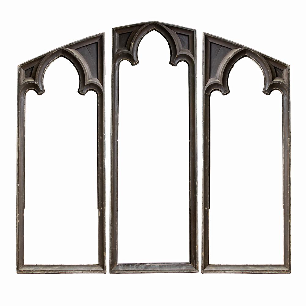 Salvaged from a chapel in Massachusetts, this set of wooden Gothic style window frames is a stunning architectural piece. The chapel was built in 1912 and the frames are well crafted and ready for any design or architecture project.

Center
