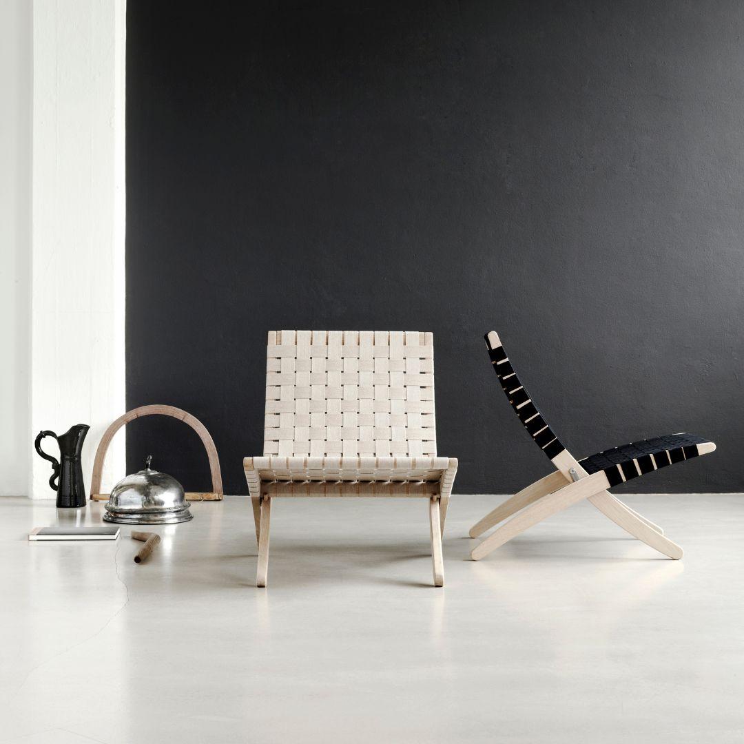 Gottler 'MG501 Cuba' chair in oak, black paint and webbing for Carl Hansen & Son

The story of Danish Modern begins in 1908 when Carl Hansen opened his first workshop. His firm commitment to beauty, comfort, refinement, and craftsmanship is
