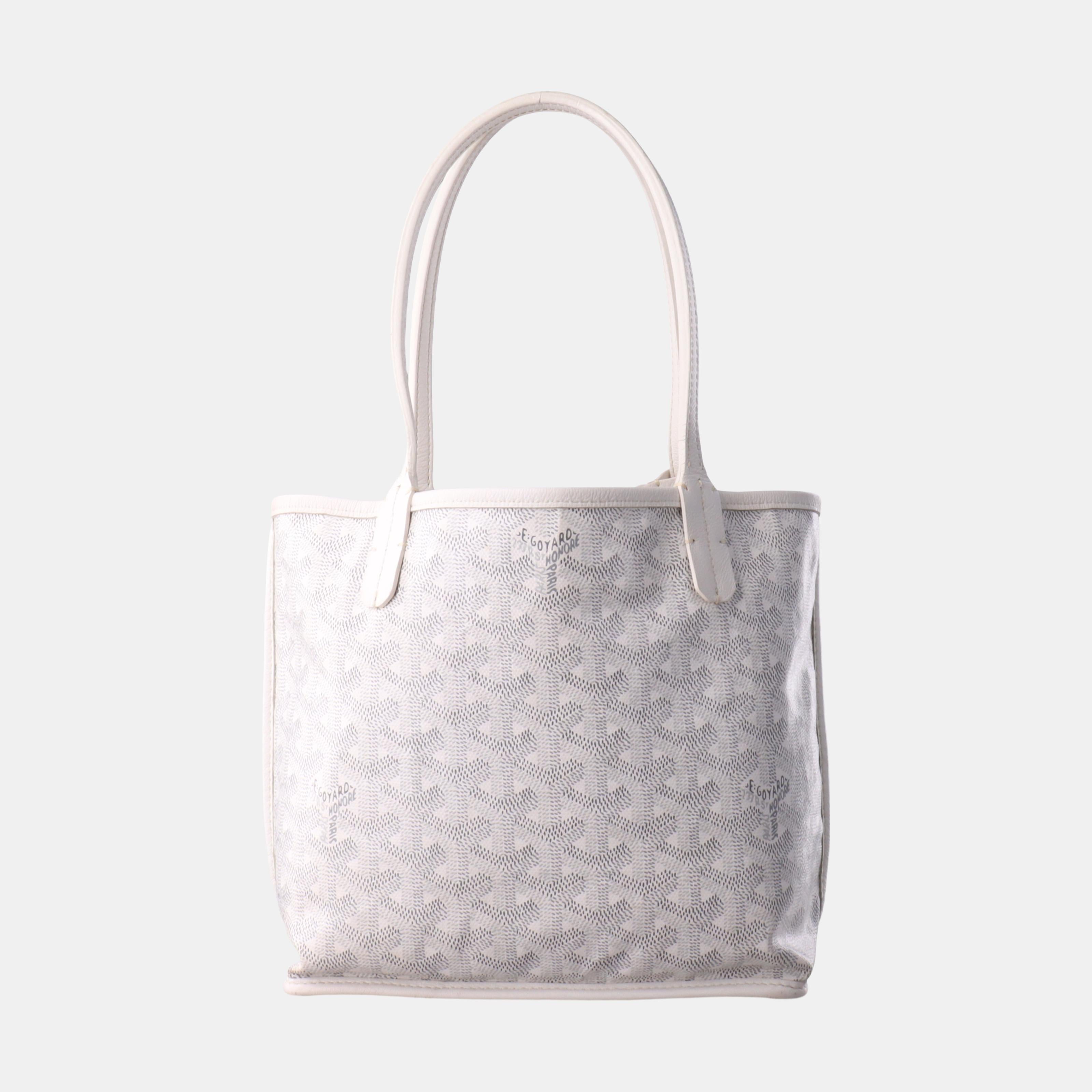 Goyard Anjou Mini Tote White Leather Reversible
 These are professional photos of the actual bag offered by Luxbags.
 This Goyard Anjou Tote PM is an iconic piece of French craftsmanship, expertly fashioned from highly coveted black leather. The