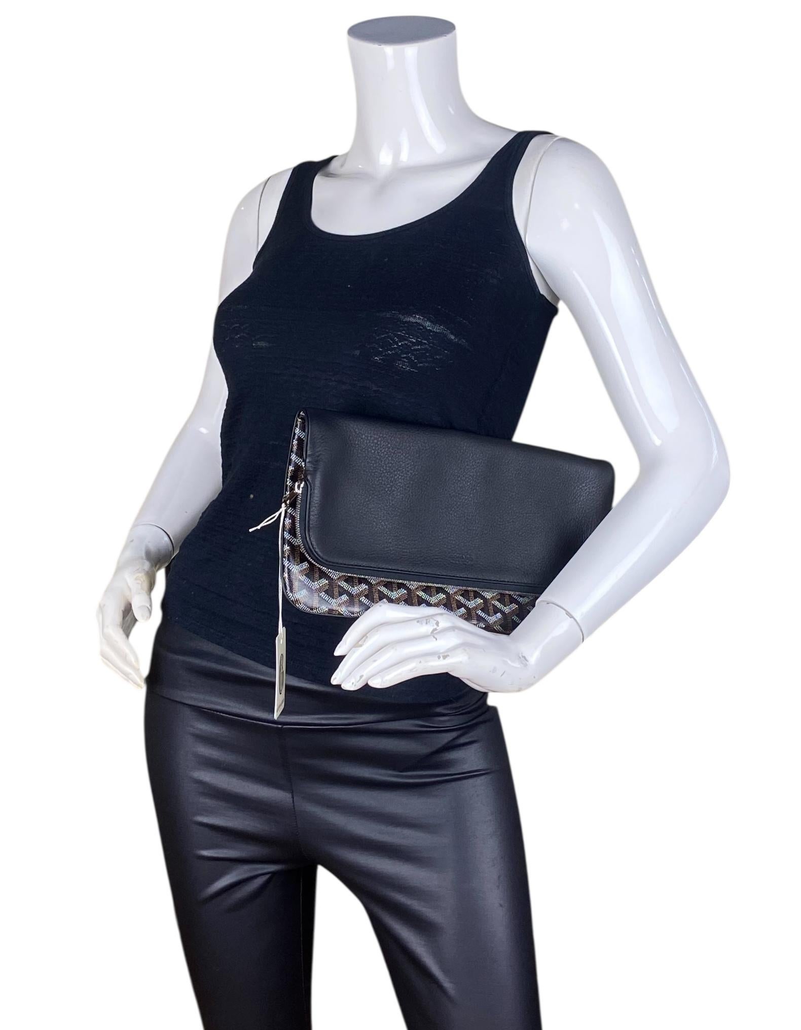 Goyard Black Goyardine Sainte Marie Pochette morbida

Prodotto in: Francia
Colore: nero
Hardware: Silvertone
Materiali: Tela rivestita e pelle
Fodera: Tela
Chiusura/apertura: Patta superiore con chiusura a cerniera
Tasche esterne: Spacco