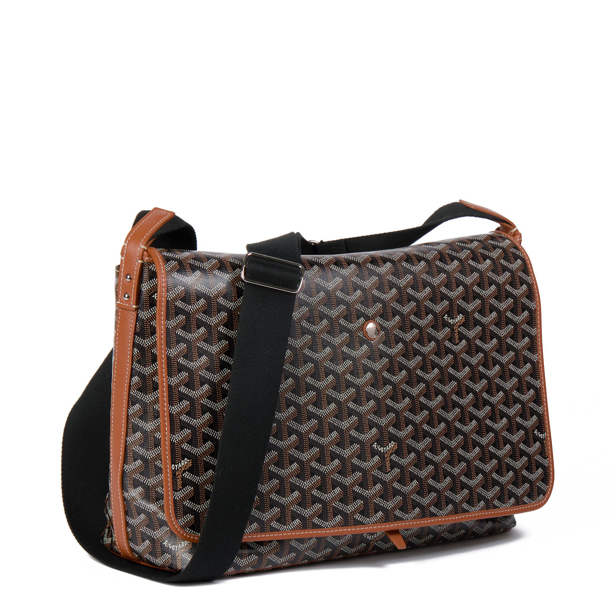 GOYARD
Black Chevron Goyardine Canvas & Brown Chevroches Calfskin Leather Capetian Messenger MM

Serial Number: ADM 020214
Age (Circa): 2021
Authenticity Details: Date Stamp (Made in Italy)
Gender: Unisex
Type: Shoulder, Messenger

Colour: Black,