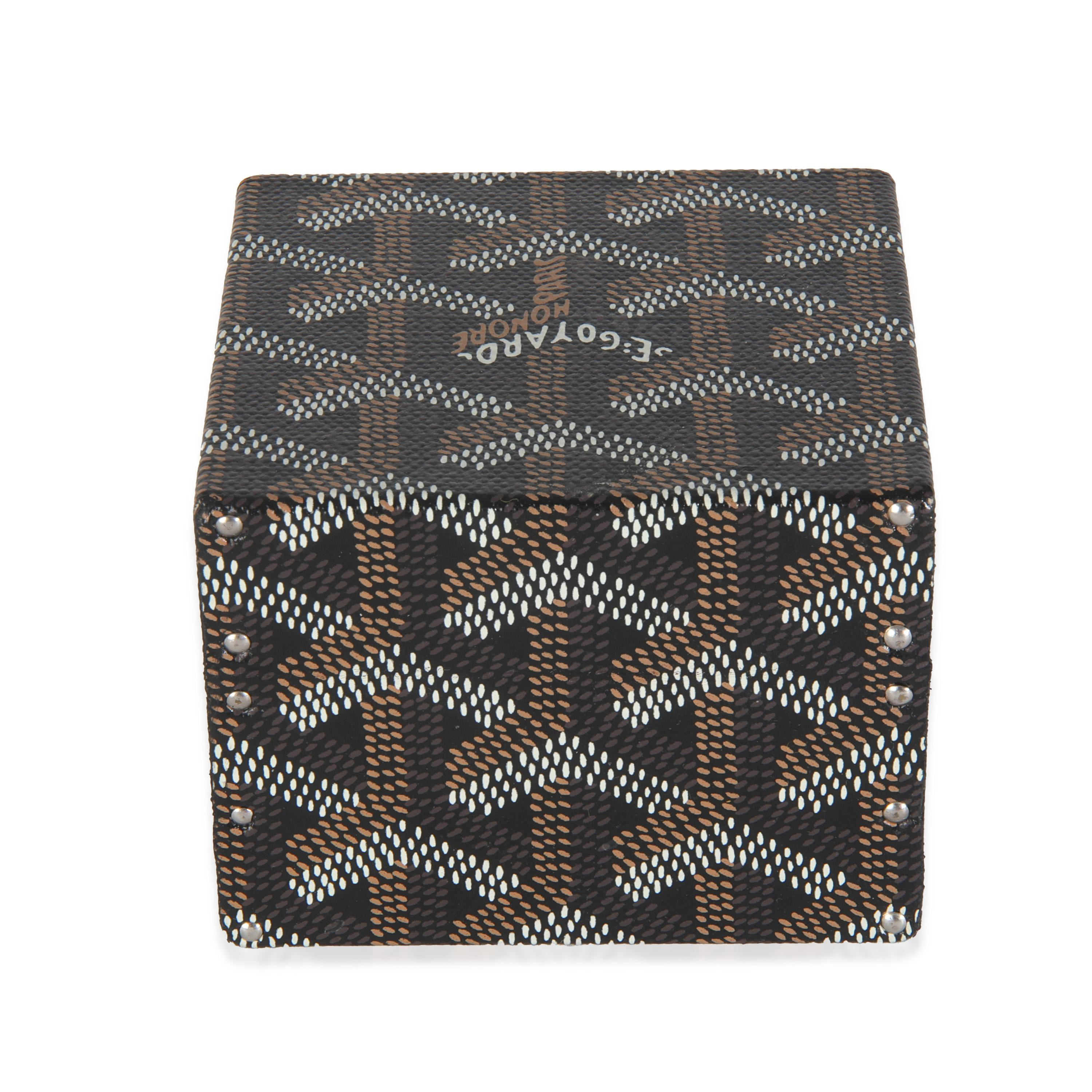 Listing Title: Goyard Black Goyardine Canvas Regence Mini Trunk
SKU: 145462
Condition: Fair
Condition Comments: Item is in fair condition with prominent signs of wear. Scuffing along corners. Scratching along hardware. Staining, marks, pressmarks