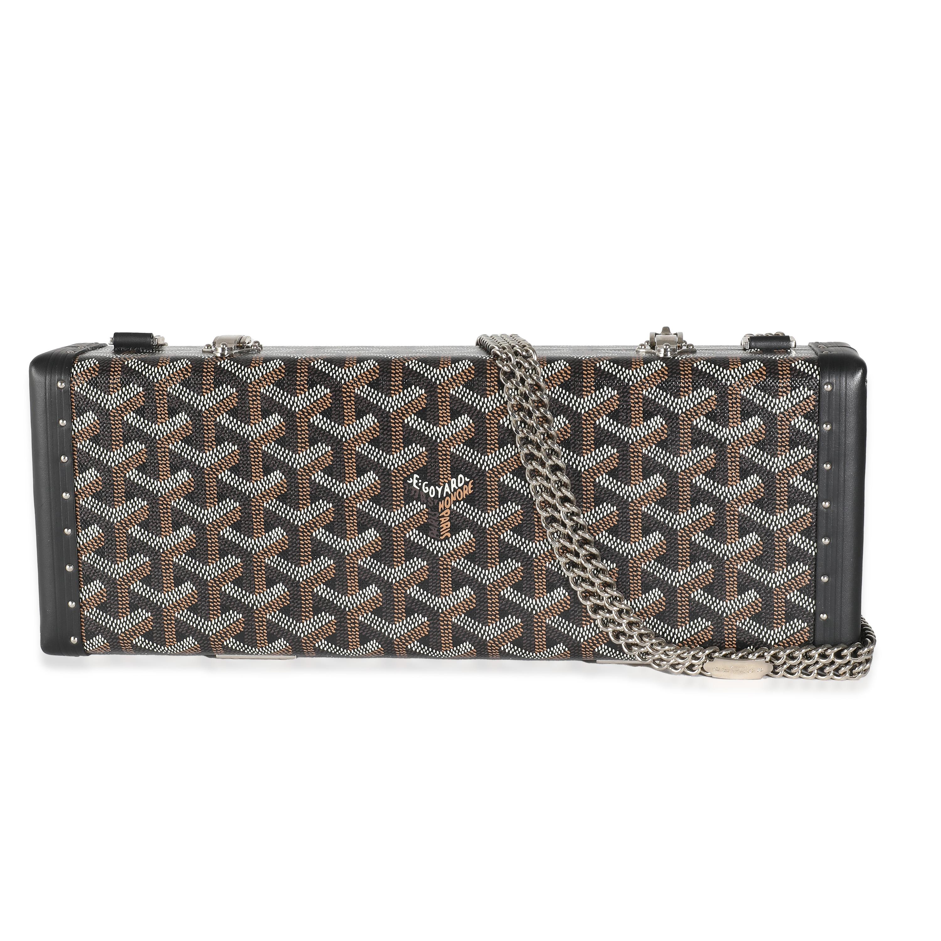 Listing Title: Goyard Black Goyardine Canvas Saint Honore Trunk Clutch
SKU: 143340
MSRP: 4715.00 USD
Condition: Pre-owned 
Condition Description: When the Saint Louis bag from Goyard was first designed, it was created to be a beach bag. Named after