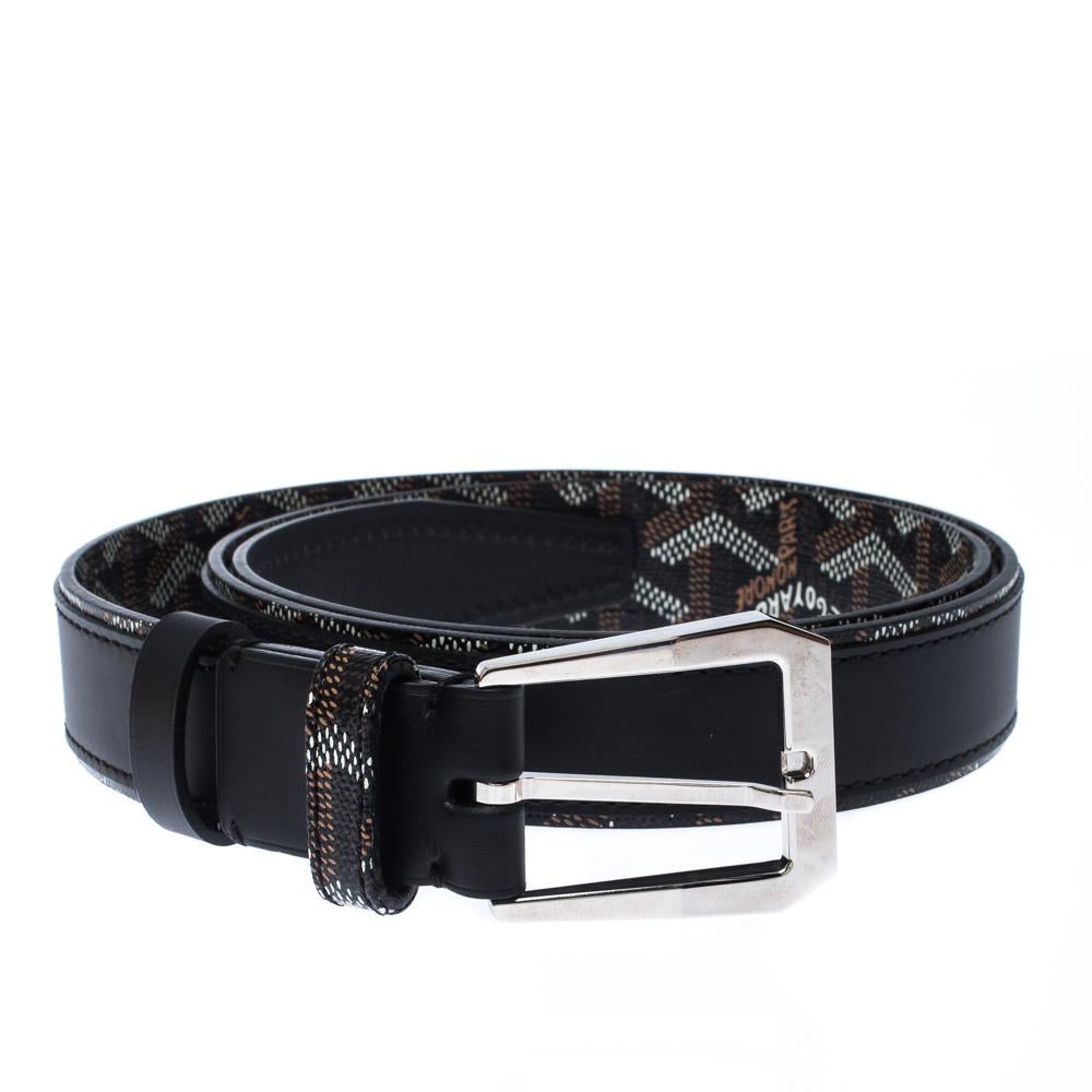 A splendid piece from the house of Goyard, this belt is an astounding creation and a worthy-investment for men who like blending fashion with subtlety. This belt is designed in a reversible style. While one side features the signature Goyardine