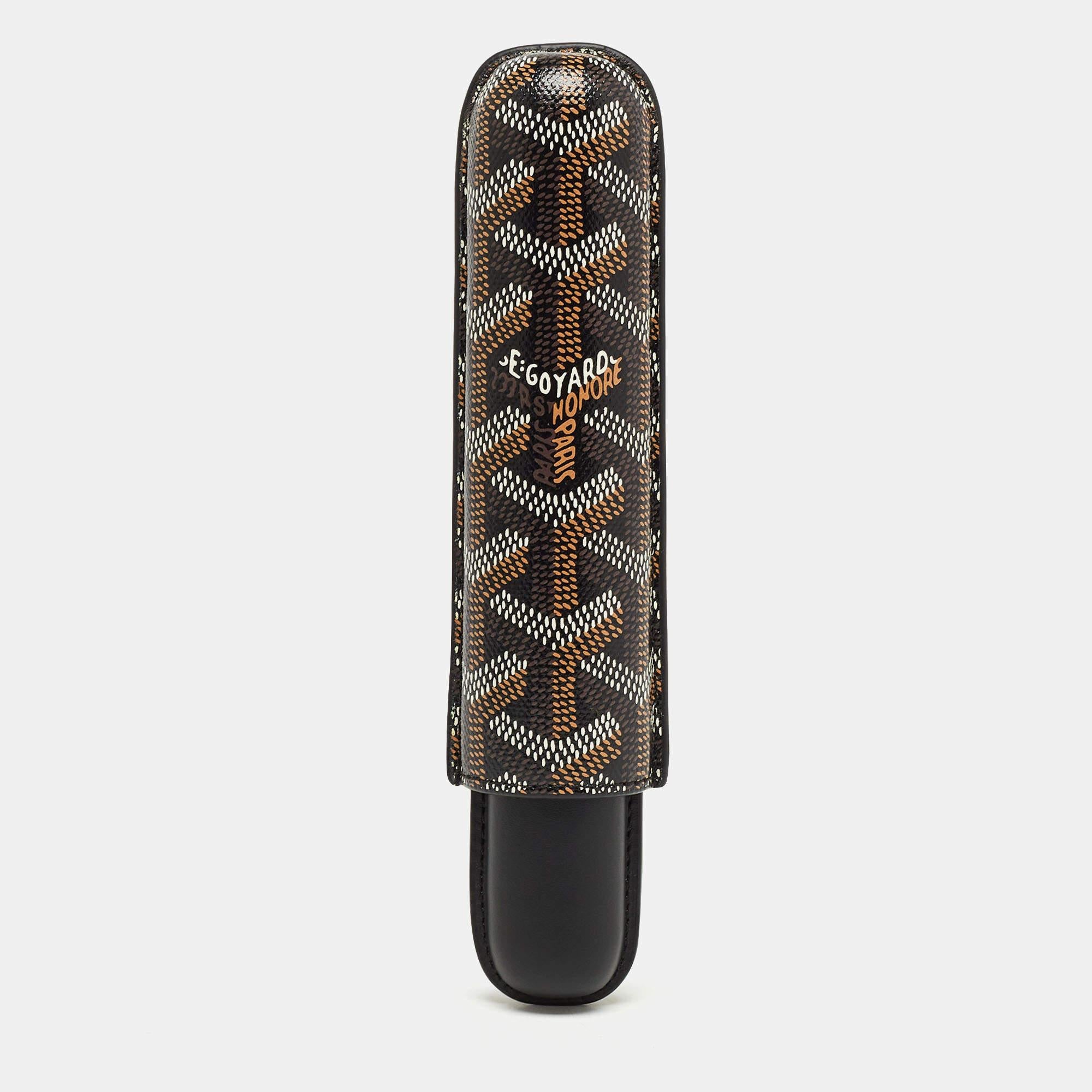 This Churchill cigar case from the house of Goyard is crafted from signature Goyardine-coated canvas as well as leather and designed to hold a single cigar.

