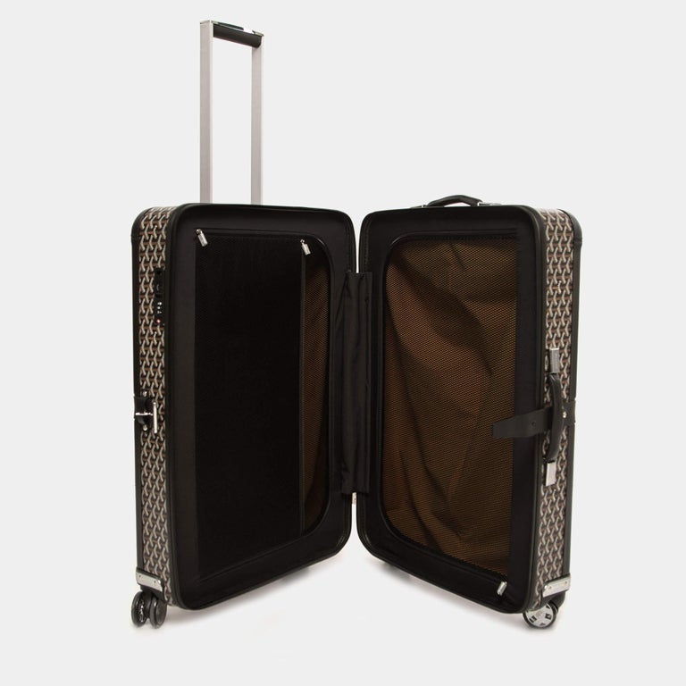 The Satolas GM wheeled suitcase / La valise roulante Satolas GM   *Specifically designed for enhanced resilience to external stresses and  shocks, the Satolas GM also offers a very generous capacity, making