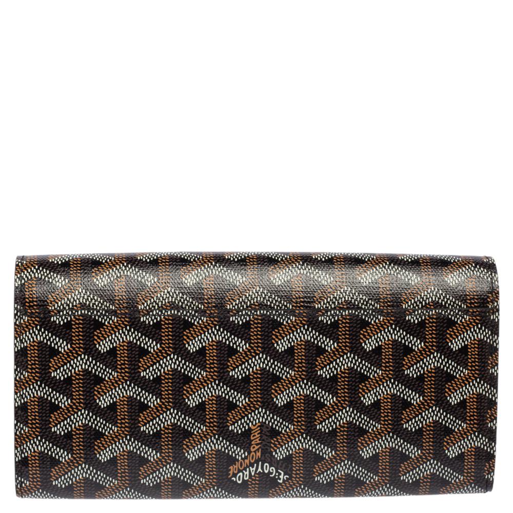 Luxuriously crafted by the experts at Goyard, this black wallet is a must-have accessory for fashion lovers. Crafted in France from the brand's signature Goyardine coated canvas, this wallet carries a sleek silhouette and a leather-lined interior.