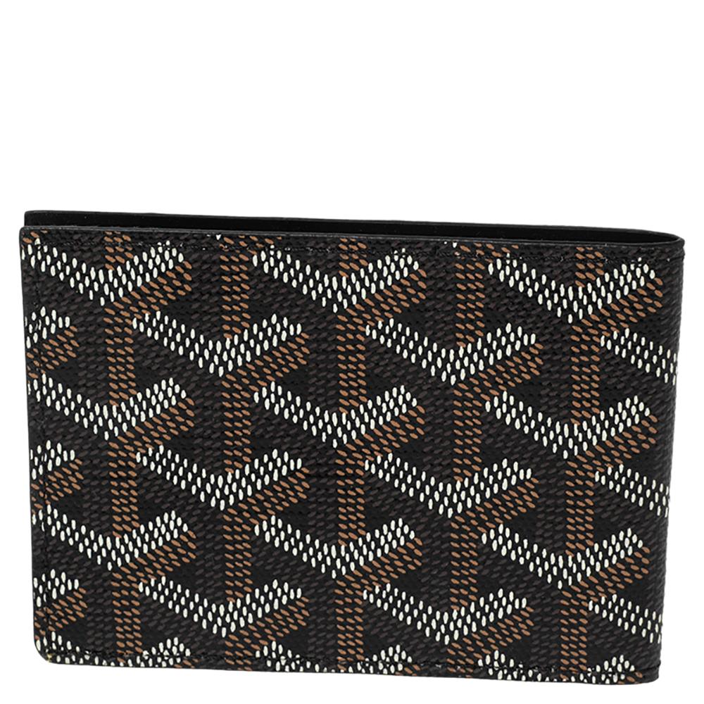 This black wallet from Goyard brings along a touch of luxury and immense style. It comes crafted from coated canvas and equipped with leather compartments and multiple slots just so you can neatly carry your cards and cash.

