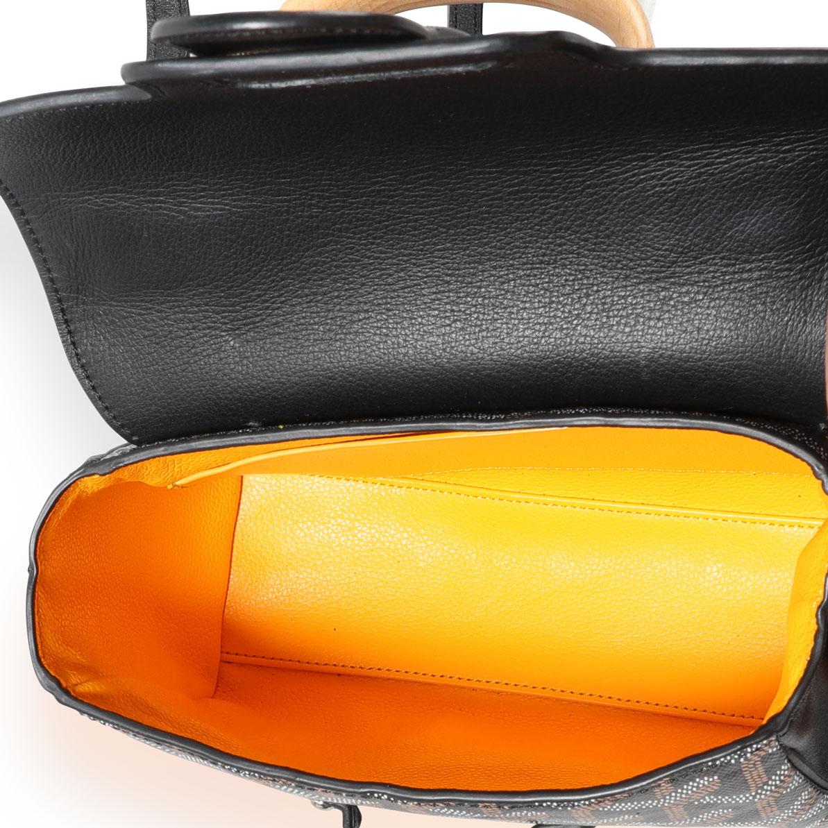 Goyard Black Goyardine Mini Saigon Bag
SKU: 111559
MSRP:  
Condition: Pre-owned (3000)
Condition Description: 
Handbag Condition: Very Good
Condition Comments: Very Good Condition. Structure loss. Wrinkling to leather.
Brand: Goyard
Model: