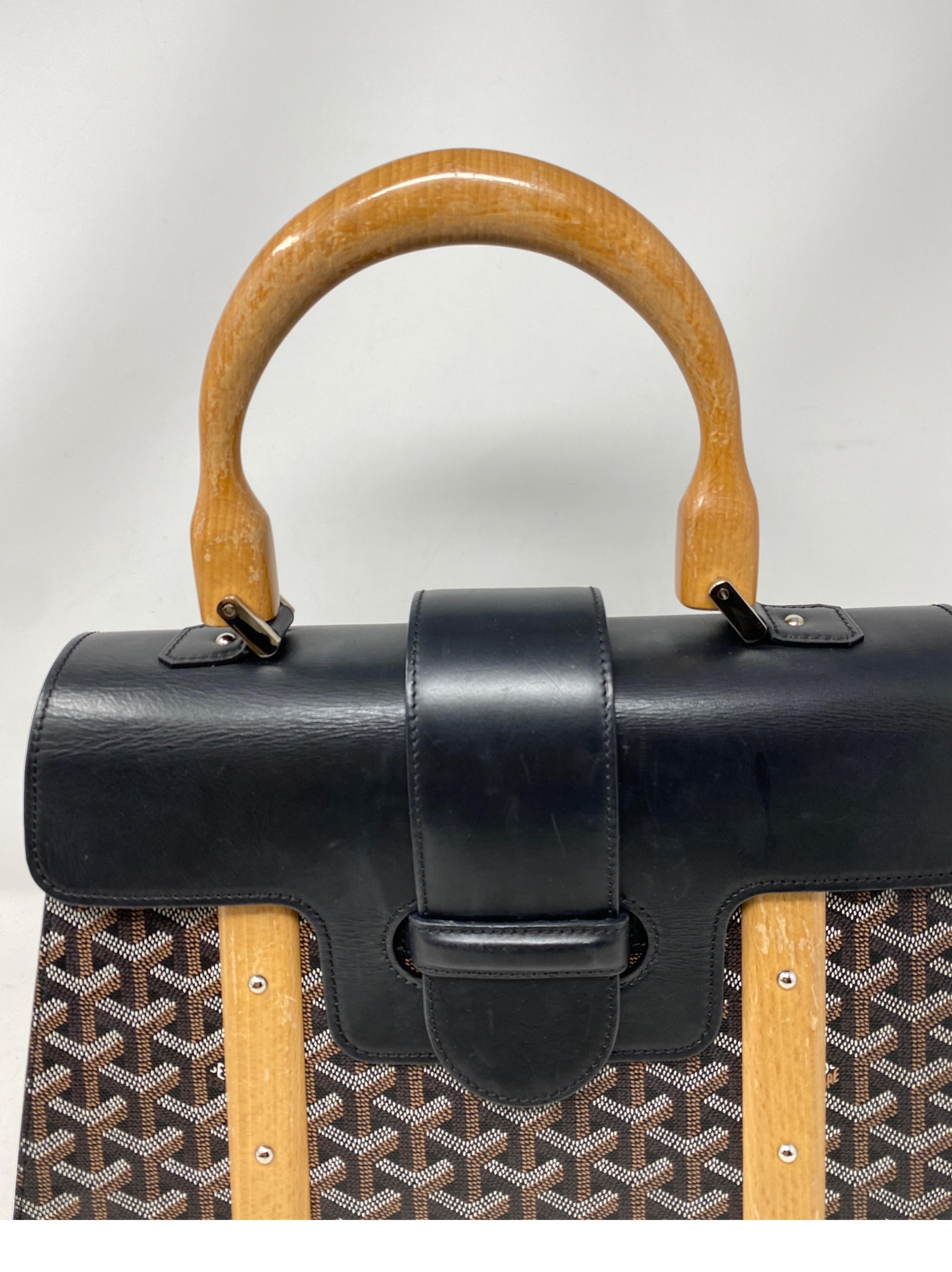 Goyard Black Saigon MM Bag. Wood and black leather large handbag. Stunning bag with beautiful details. Has some wear on the inside. Light stains. Overall good condition. Don't miss out. Guaranteed authentic. 