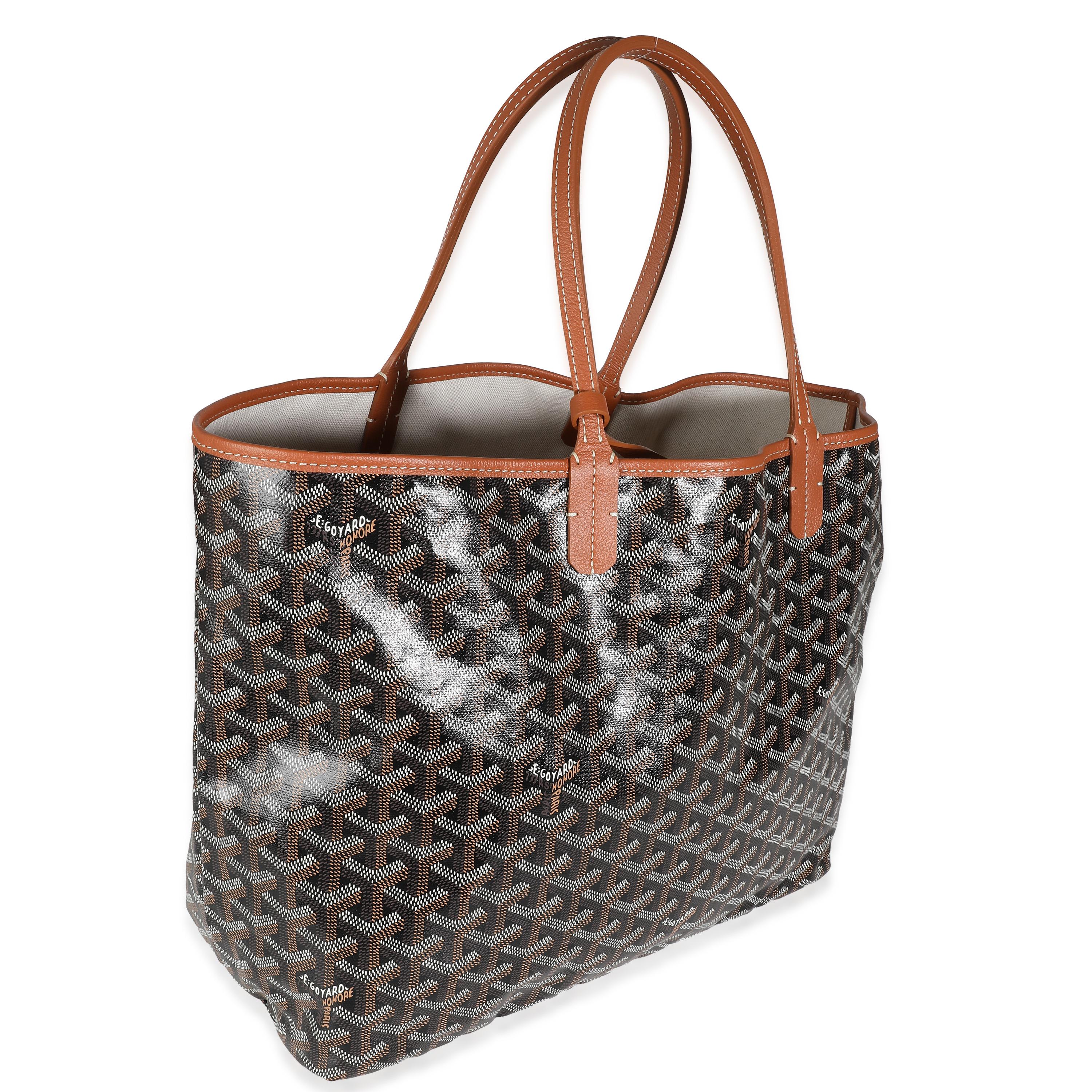 Listing Title: Goyard Black Tan Goyardine Canvas Saint Louis PM
SKU: 139828
Condition: Pre-owned 
Condition Description: Goyard’s signature Goyardine pattern has quietly taken over the luxury fashion scene. A heritage brand that has been around