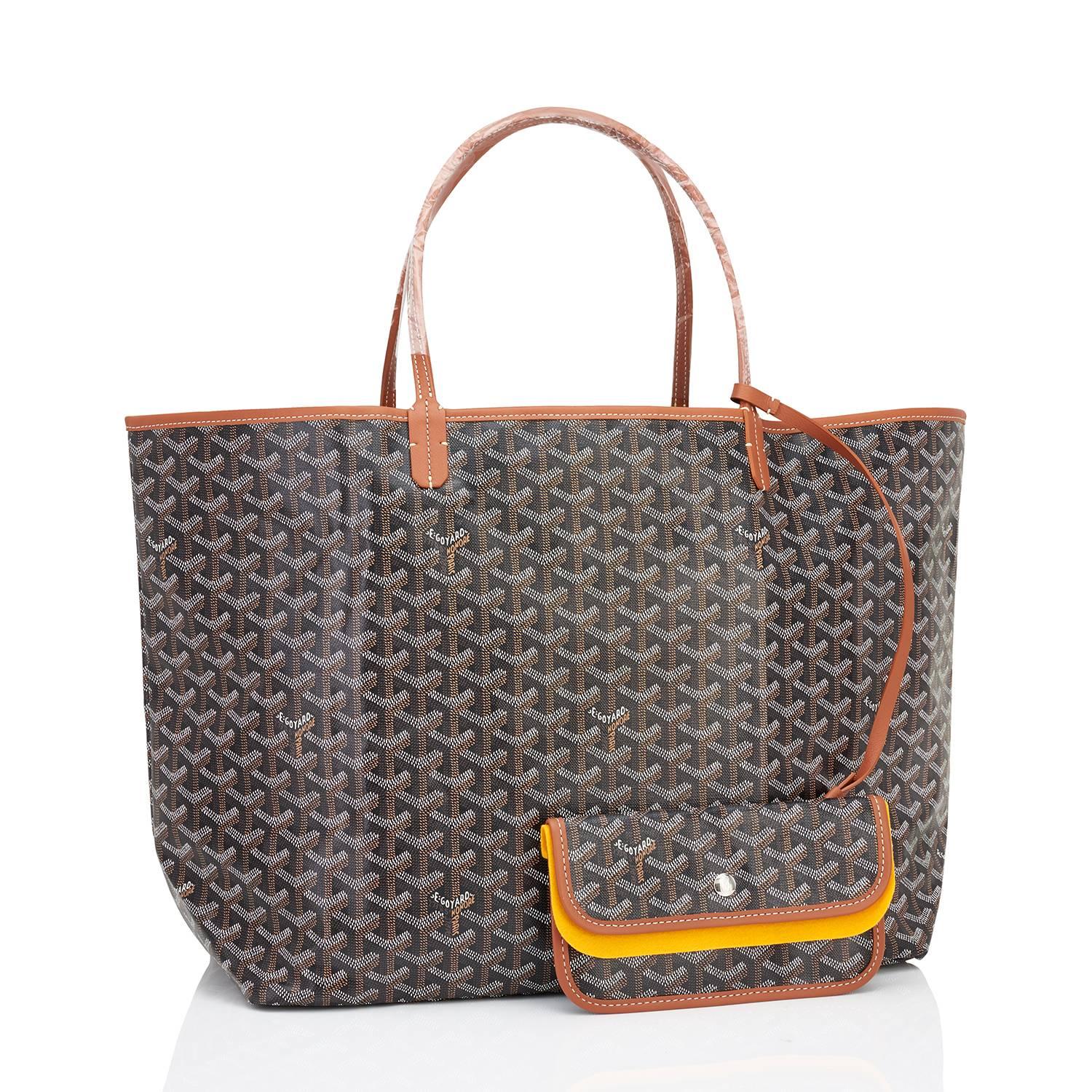 Goyard Black with Tan Trim St Louis GM Chevron Tote Bag Chic
Brand New.  Store Fresh. Pristine Condition (with plastic on handles)
Perfect gift! Comes with yellow Goyard sleeper, inner organizational pochette, and inner yellow protective felt.
This