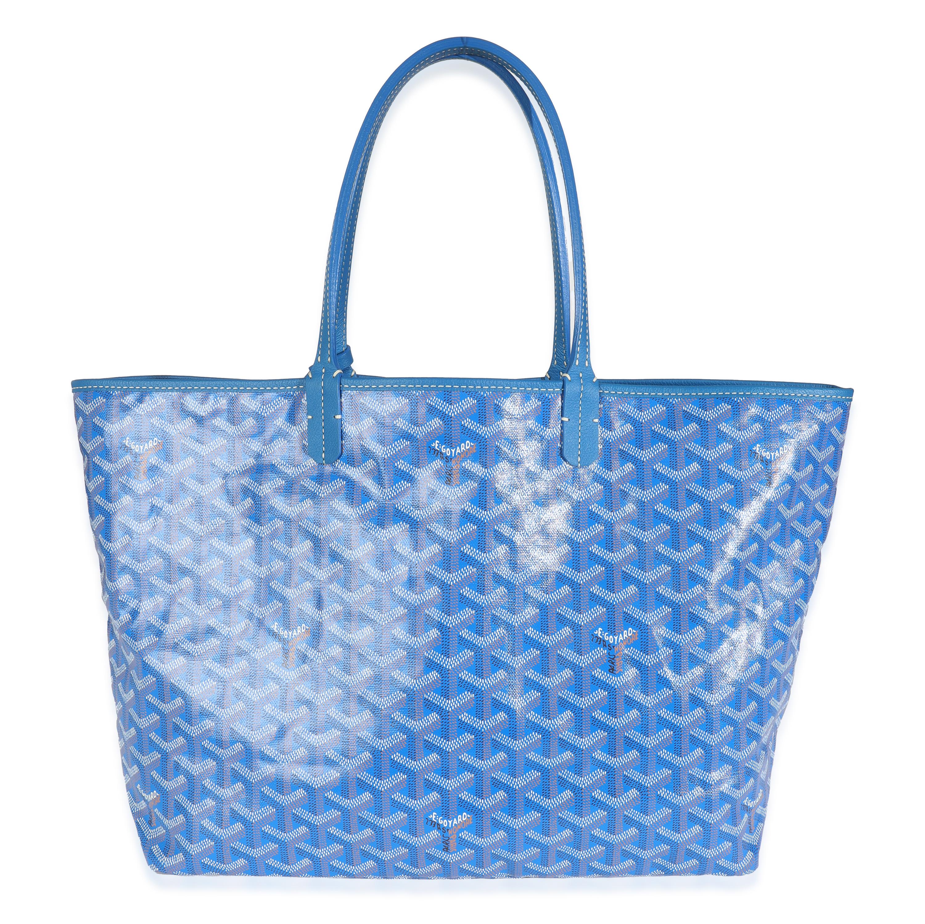 Listing Title: Goyard Blue Goyardine Canvas Saint Louis PM
SKU: 146622
Condition: Pre-owned 
Condition Description: Goyard’s signature Goyardine pattern has quietly taken over the luxury fashion scene. A heritage brand that has been around since