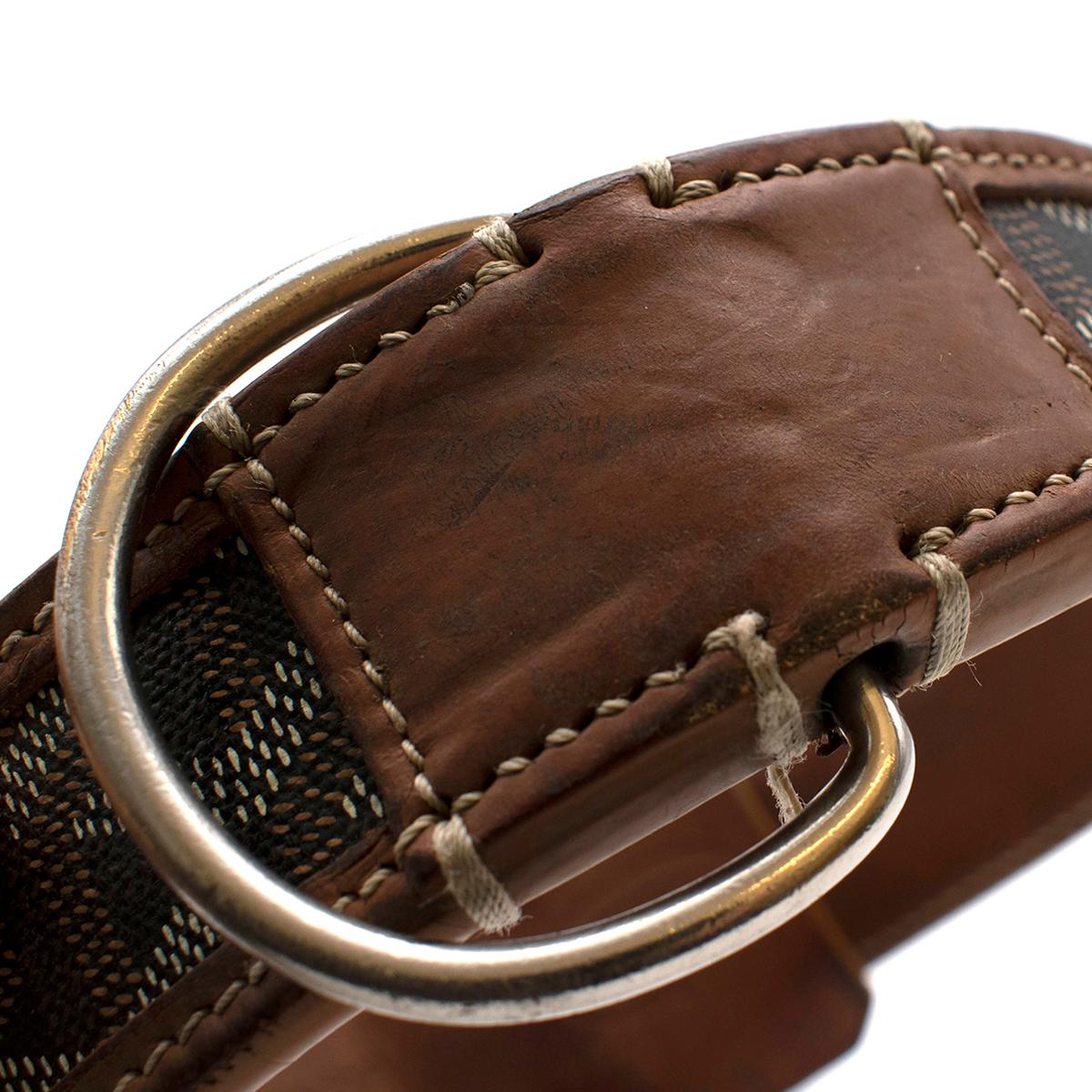 Goyard Brown Goyardine Canvas & Leather Dog Collar

- Made of the iconic Goyardine patterned canvas 
- Brown hues 
- Leather trims 
- Adjustable buckle fastening 
- Leather lining 
- Contrasting stitching 
- Brnaded to the hardware 
- Silver tone