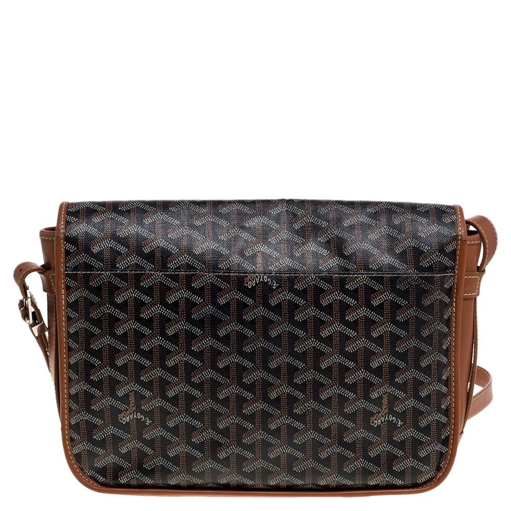 Carry this stylish Goyard Belvedere saddle bag to the Sunday brunch and look uber cool! Crafted in Goyardine canvas and leather, the bag features the iconic chevron print with an adjustable leather strap and silver-tone hardware. Lined in canvas,