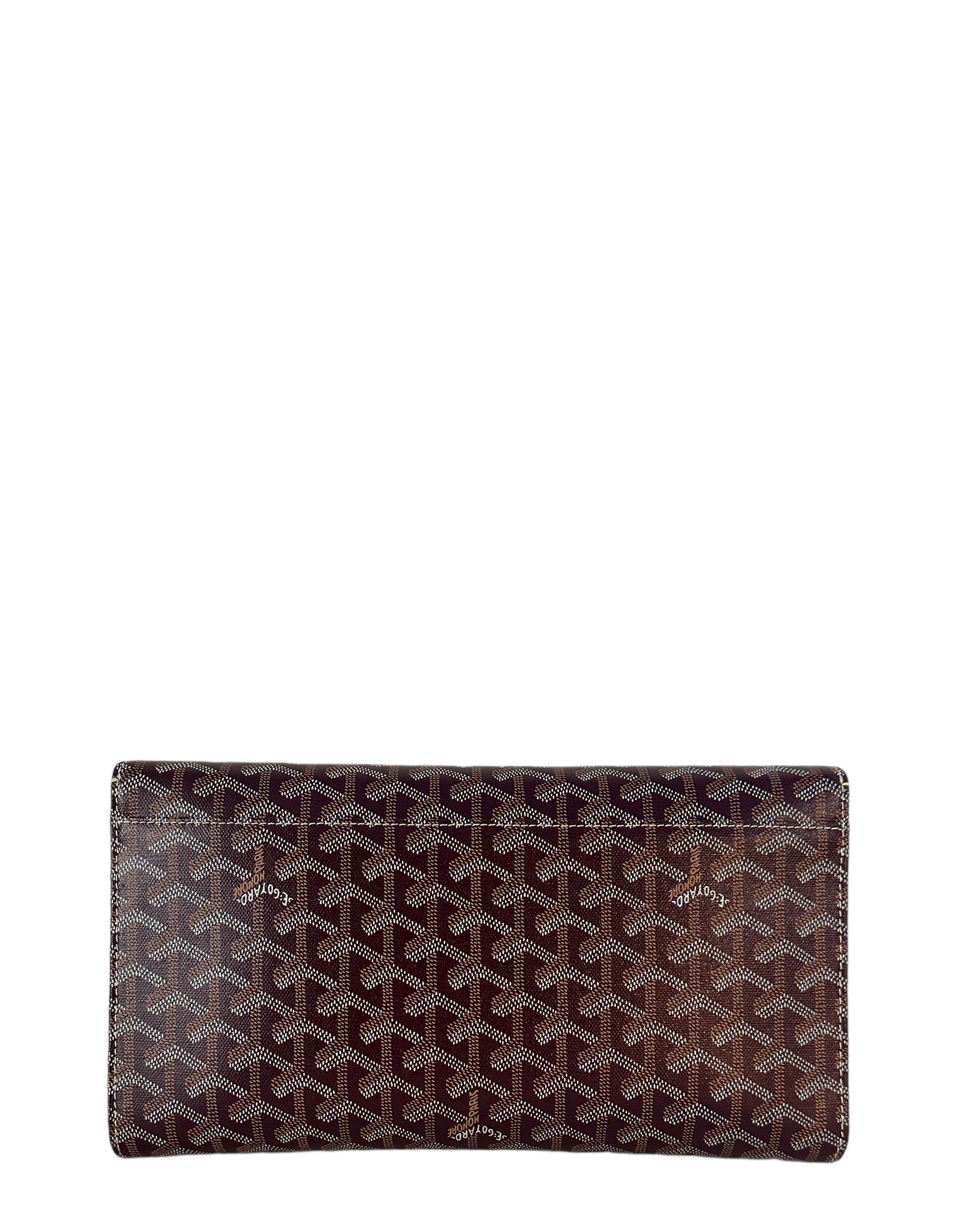 Goyard Burgundy Goyardine Monte Carlo Bois Clutch Bag. Please note, this bag does not include the strap. 

Made In: France
Color: Burgundy
Hardware: Silvertone
Materials: Coated canvas and leather
Lining: Canvas
Closure/Opening: Flap top with snap