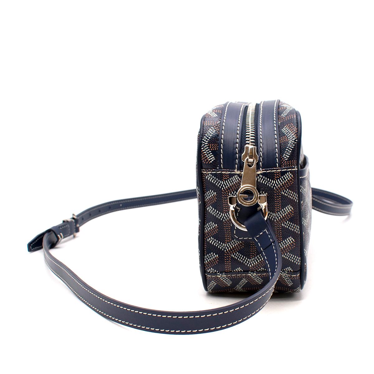 Goyard Cap Vert Crossbody Goyardine Navy Blue 

Luxury and casual sophistication blend together to create this rare and stylish Goyard Navy Chevron Print Coated Canvas Sac Cap-vert Messenger Bag. 
-Small style bag features the classic Goyard chevron