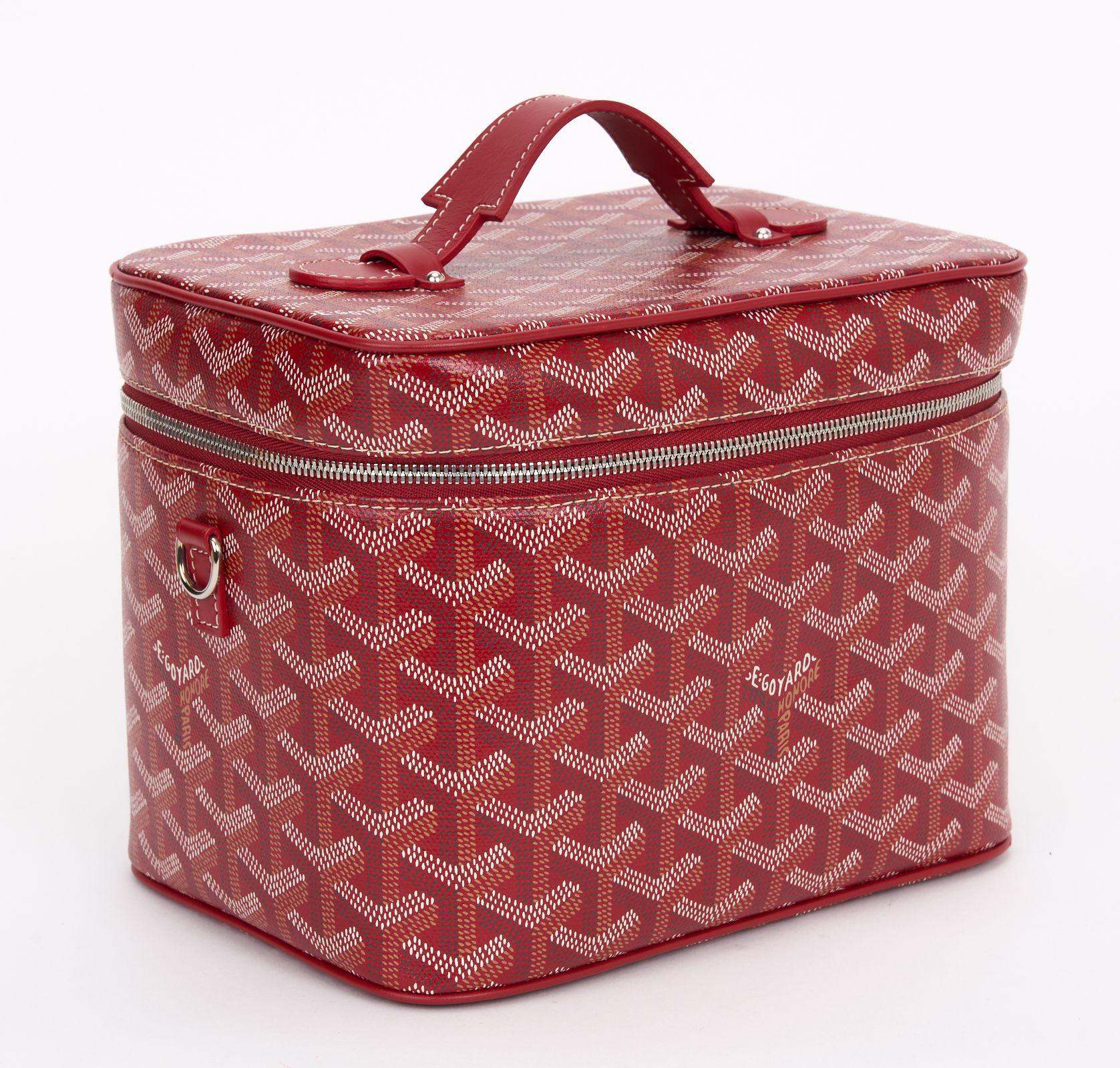 The Goyard Cosmetic Bag Train case from the 2020 Collection, features printed red
Goyardine canvas, silver hardware, single adjustable shoulder strap, canvas lining and single interior pocket and a zip closure. Minor wear inside, comes with original