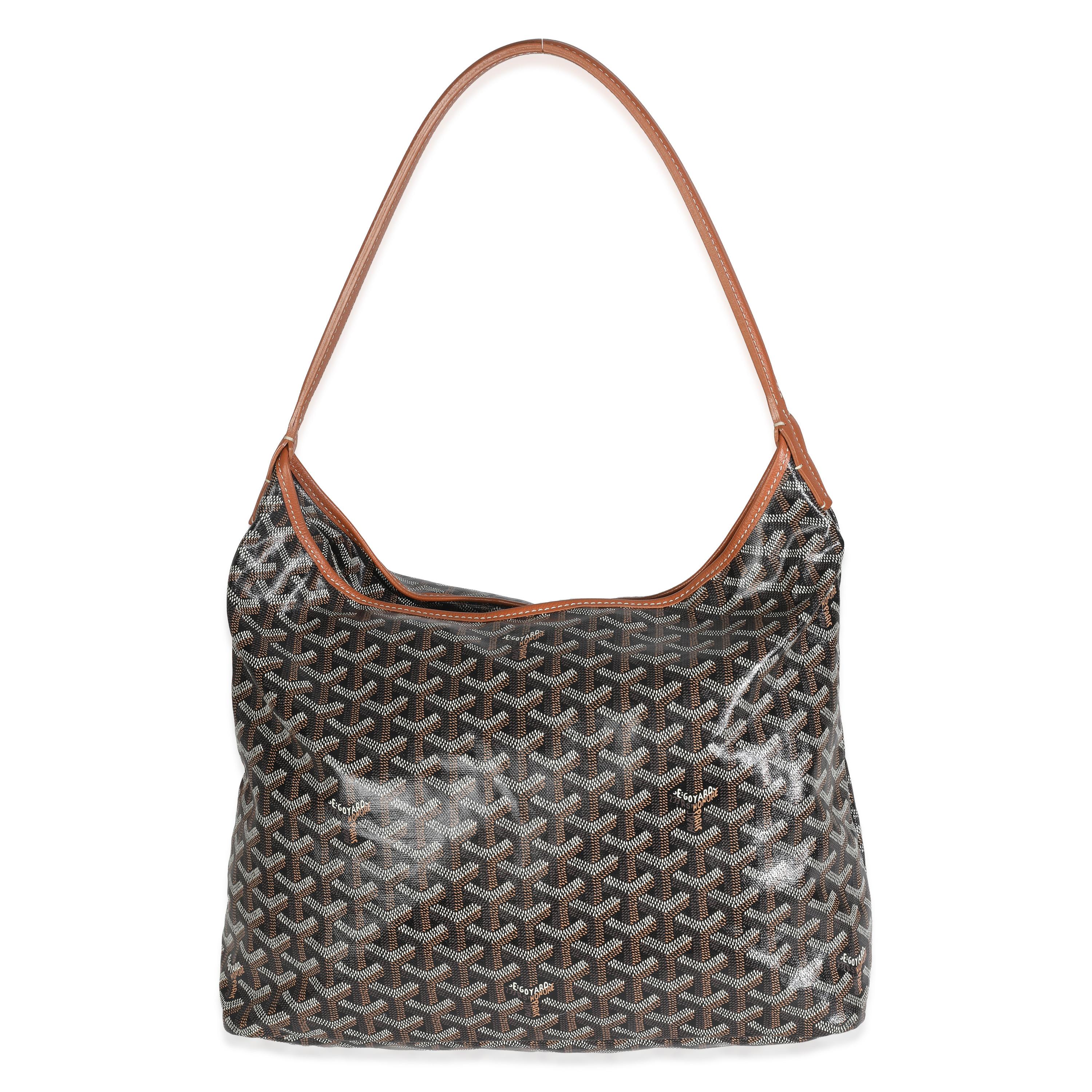 Listing Title: Goyard Gold Black Goyardine Boheme Hobo
SKU: Z147277
Condition: Pre-owned 
Handbag Condition: Excellent
Condition Comments: Item is in excellent condition and displays light signs of wear. Light cracking along strap. Minor fading