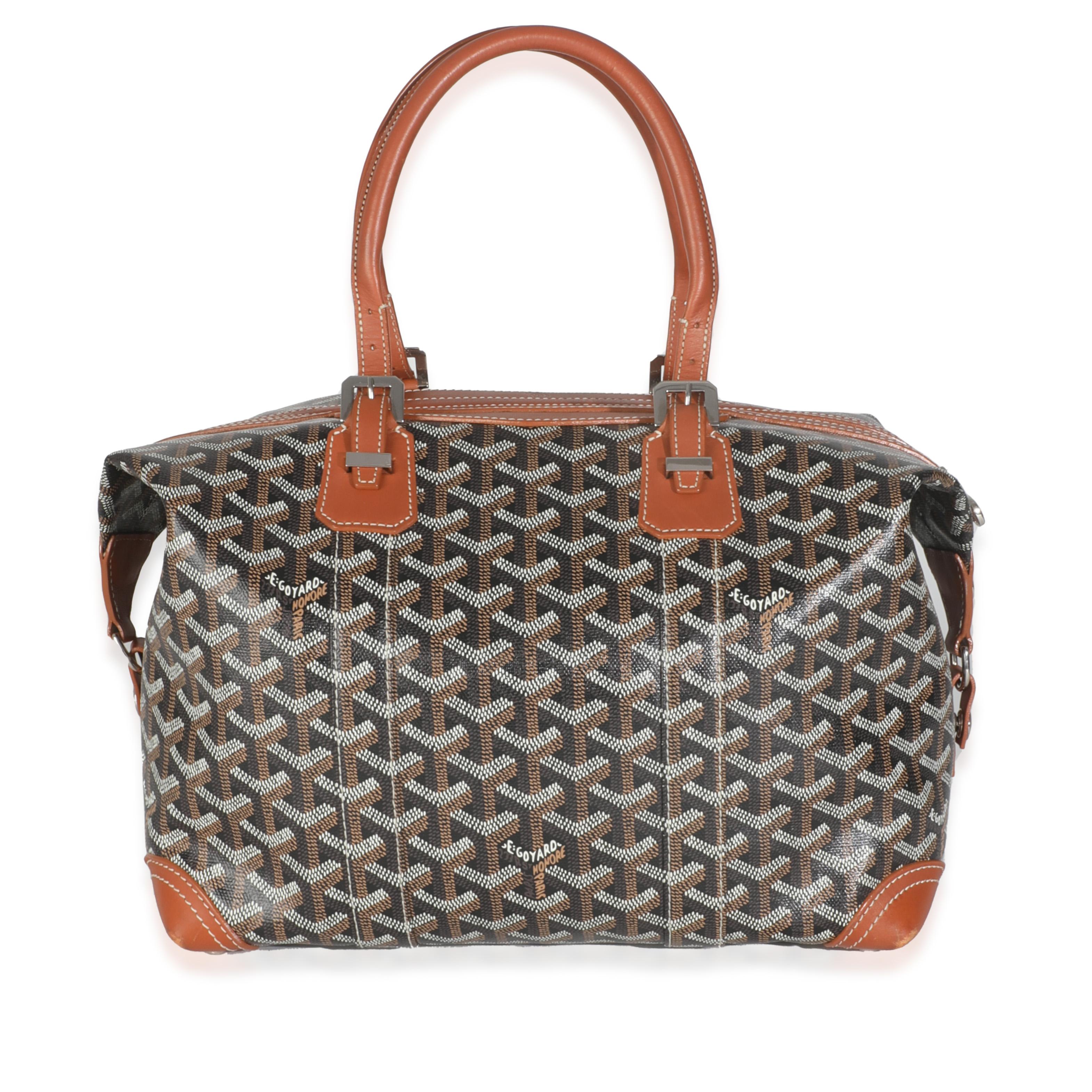 Titre de la liste : Goyard Gold Black Goyardine Canvas Boeing 30
SKU : Z145445
Condit : Usagé 
Condit : Le motif Goyardine, signature de Goyard, s'est discrètement imposé sur la scène de la mode de luxe. Marque patrimoniale qui existe depuis 1853,