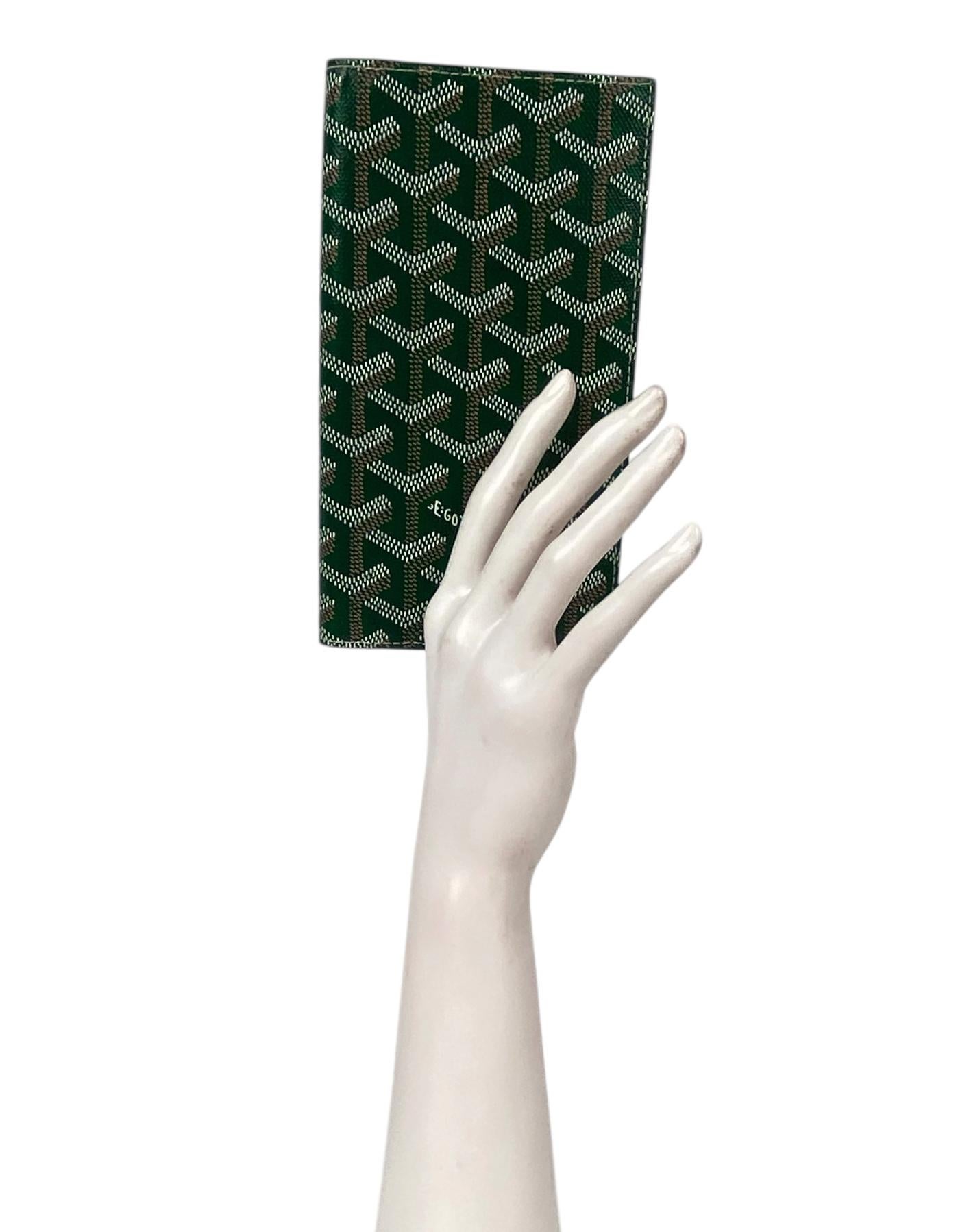 Goyard Goyardine Green Saint Roch Wallet

Color: Green
Materials: Goyardine canvas
Interior: Green leather
Compartments: Four slit pockets, six credit card slots
Overall Condition: Excellent

Measurements:
7.25