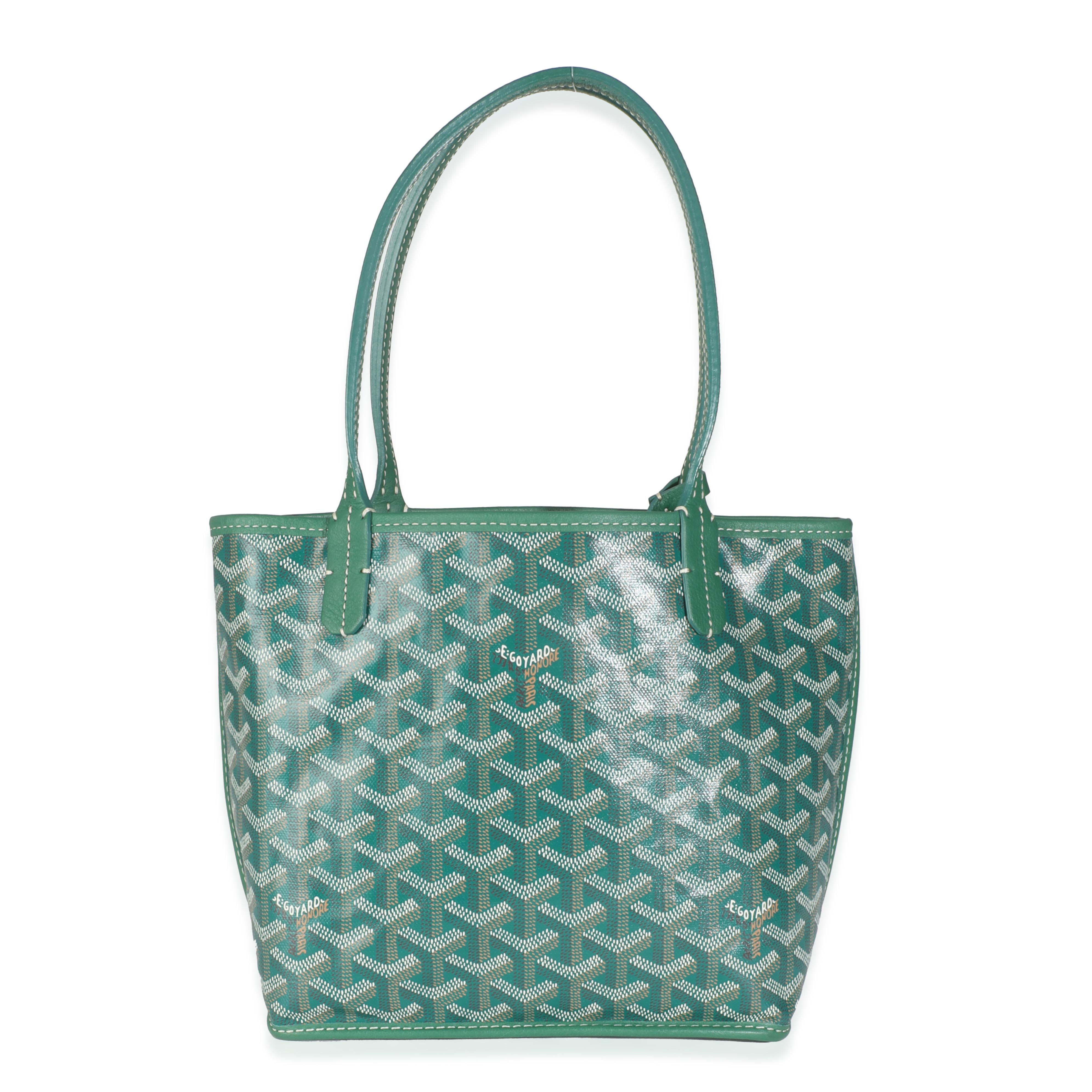 Listing Title: Goyard Green Goyardine Canvas Mini Anjou
SKU: Z145444
Condition: Pre-owned 
Condition Description: Expert craftsmanship and timeless design are at the core of French fashion House Goyard. The iconic Anjou tote bag is recognized for