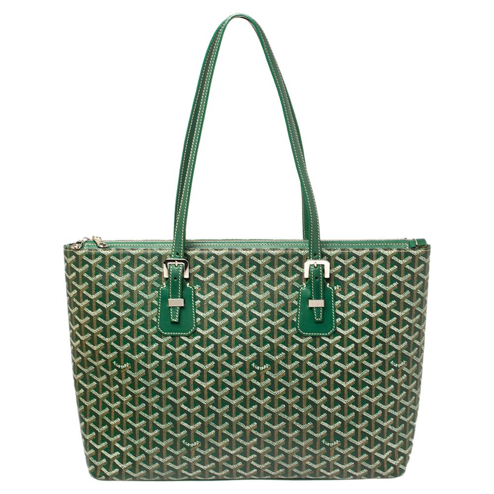 Goyard's Goyardine pattern adds a luxurious touch to its bags and this Okinawa tote will brighten up your looks! This tote features the signature pattern on the canvas exterior in a green shade. Accented with leather trim, this bag comes with dual