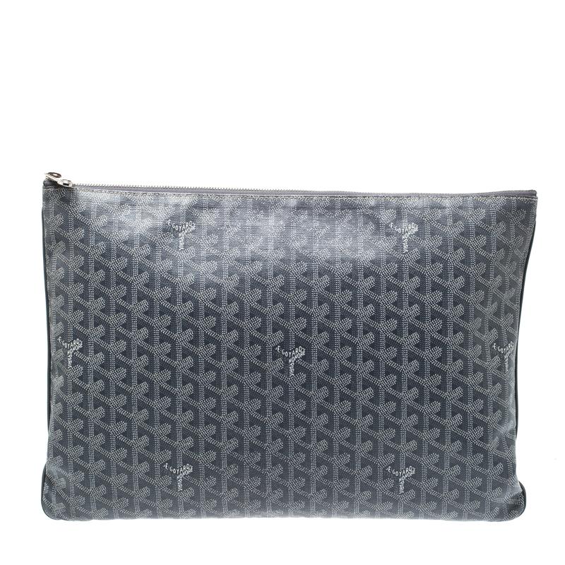 We are showering our love on this clutch from Goyard as it is utterly gorgeous. It is marked by qualities such as refined craftsmanship and first-rate classic style. It is crafted from signature Goyardine canvas and equipped with a spacious fabric