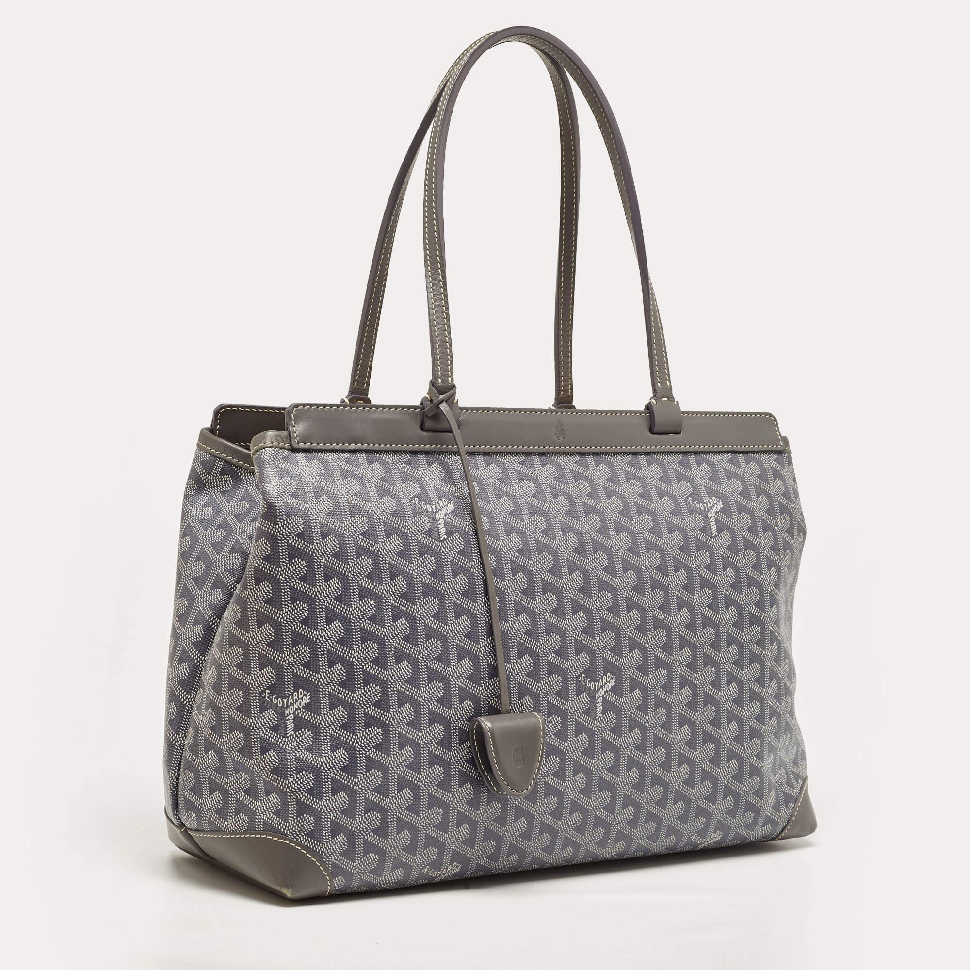 The classy silhouette and the use of durable materials for the exterior bring out the appeal of this Goyard tote for women. It features comfortable handles and a well-lined interior.

